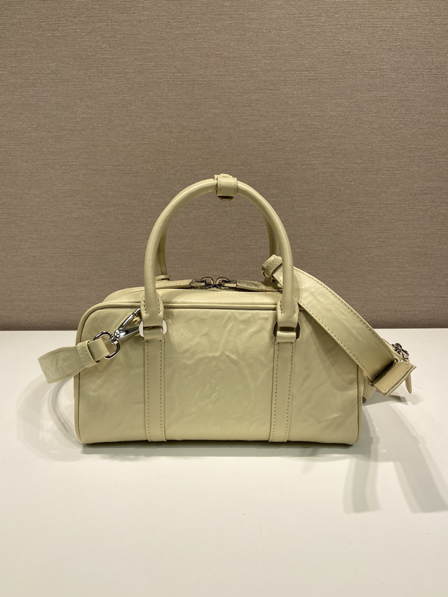 Pra*a antique nappa leather multi-pocket top-handle bag