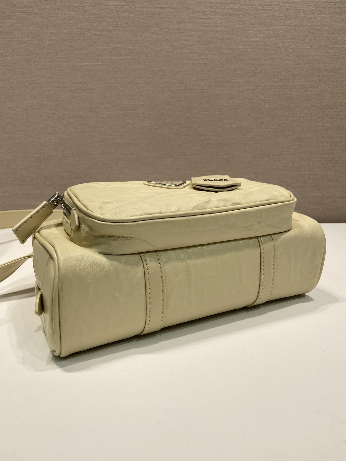 Pra*a antique nappa leather multi-pocket top-handle bag