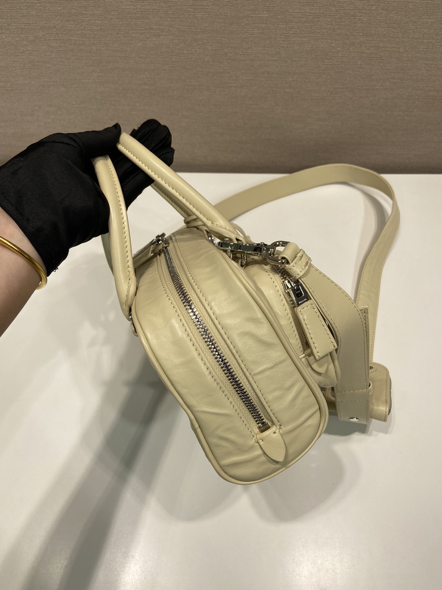 Pra*a antique nappa leather multi-pocket top-handle bag