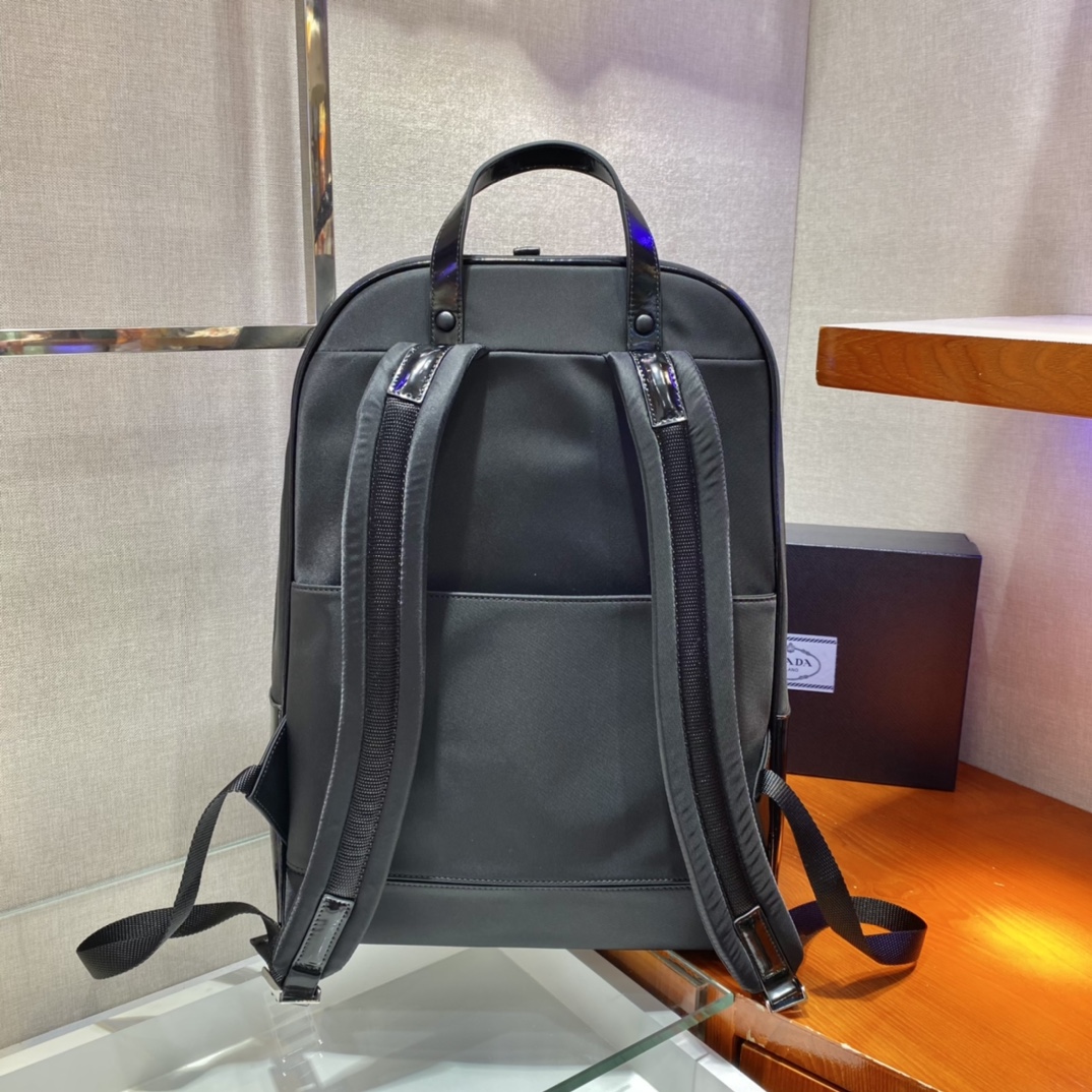 Pra*a black re-nylon and leather backpack