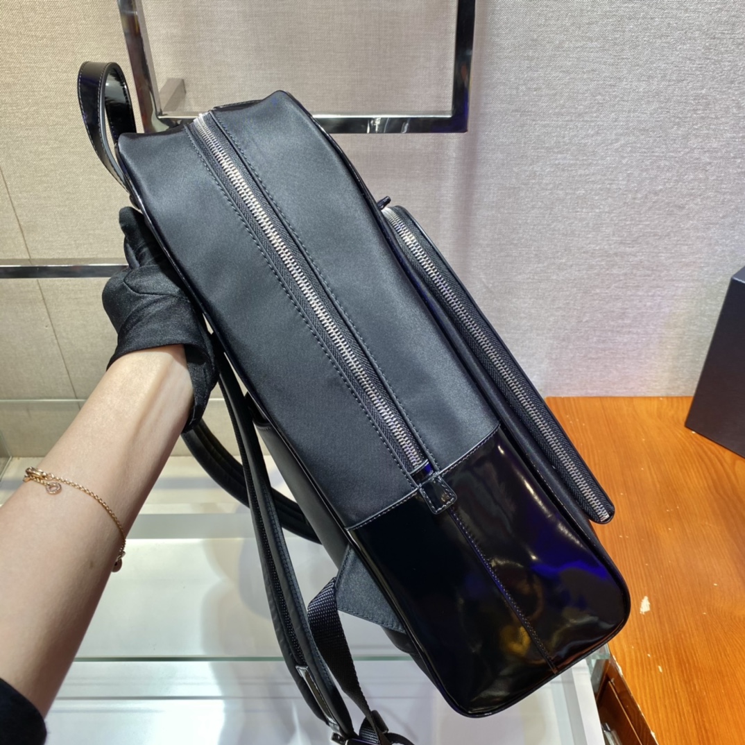 Pra*a black re-nylon and leather backpack