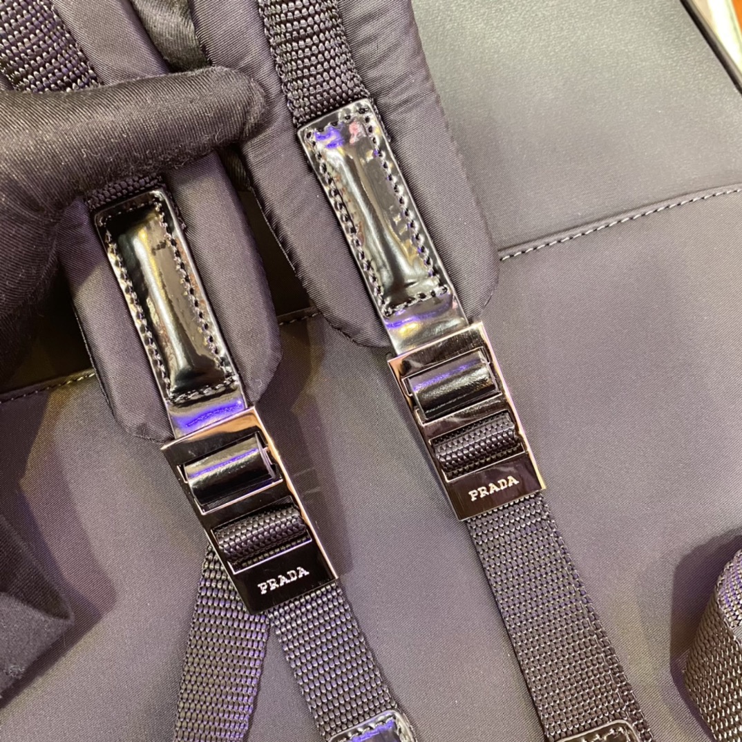 Pra*a black re-nylon and leather backpack