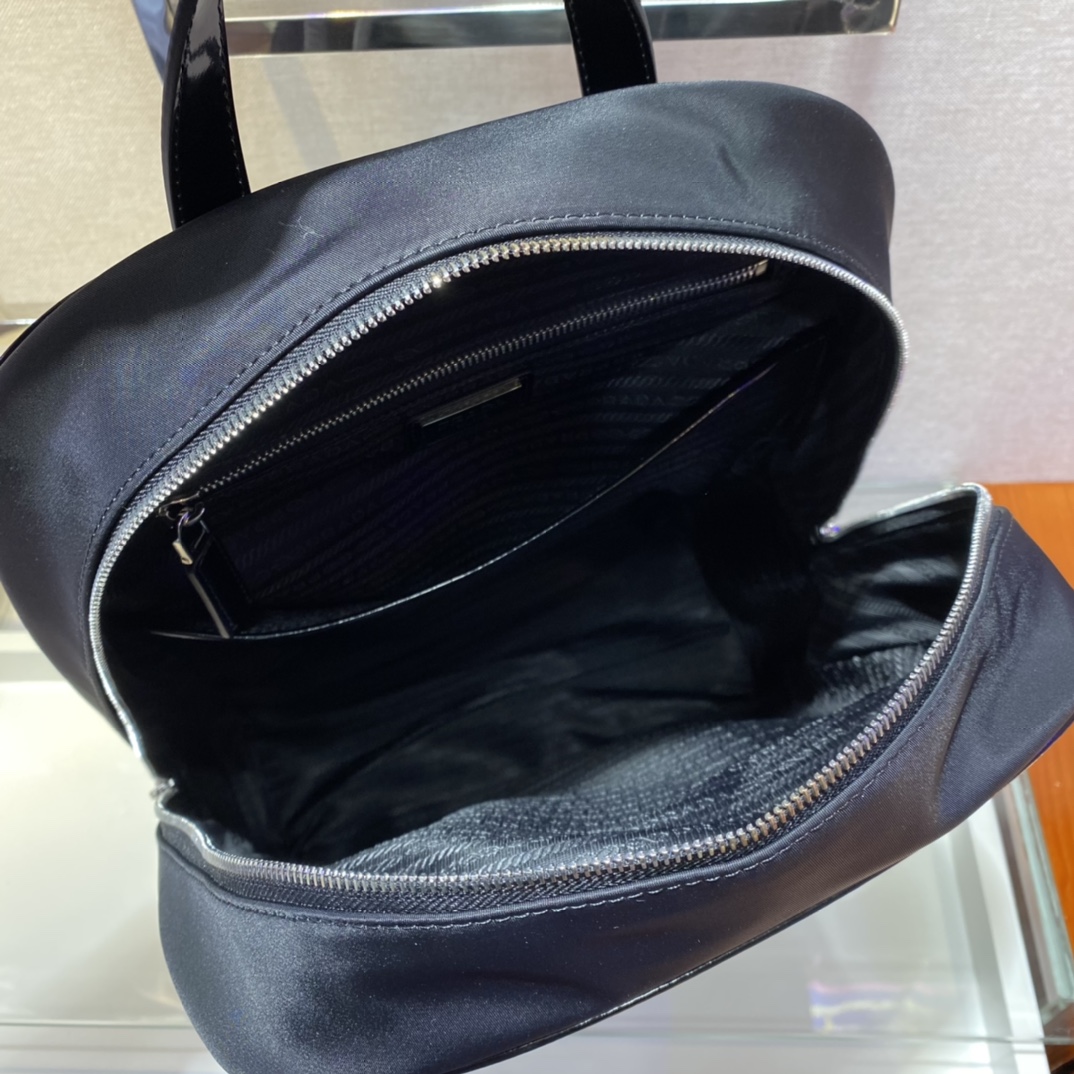 Pra*a black re-nylon and leather backpack
