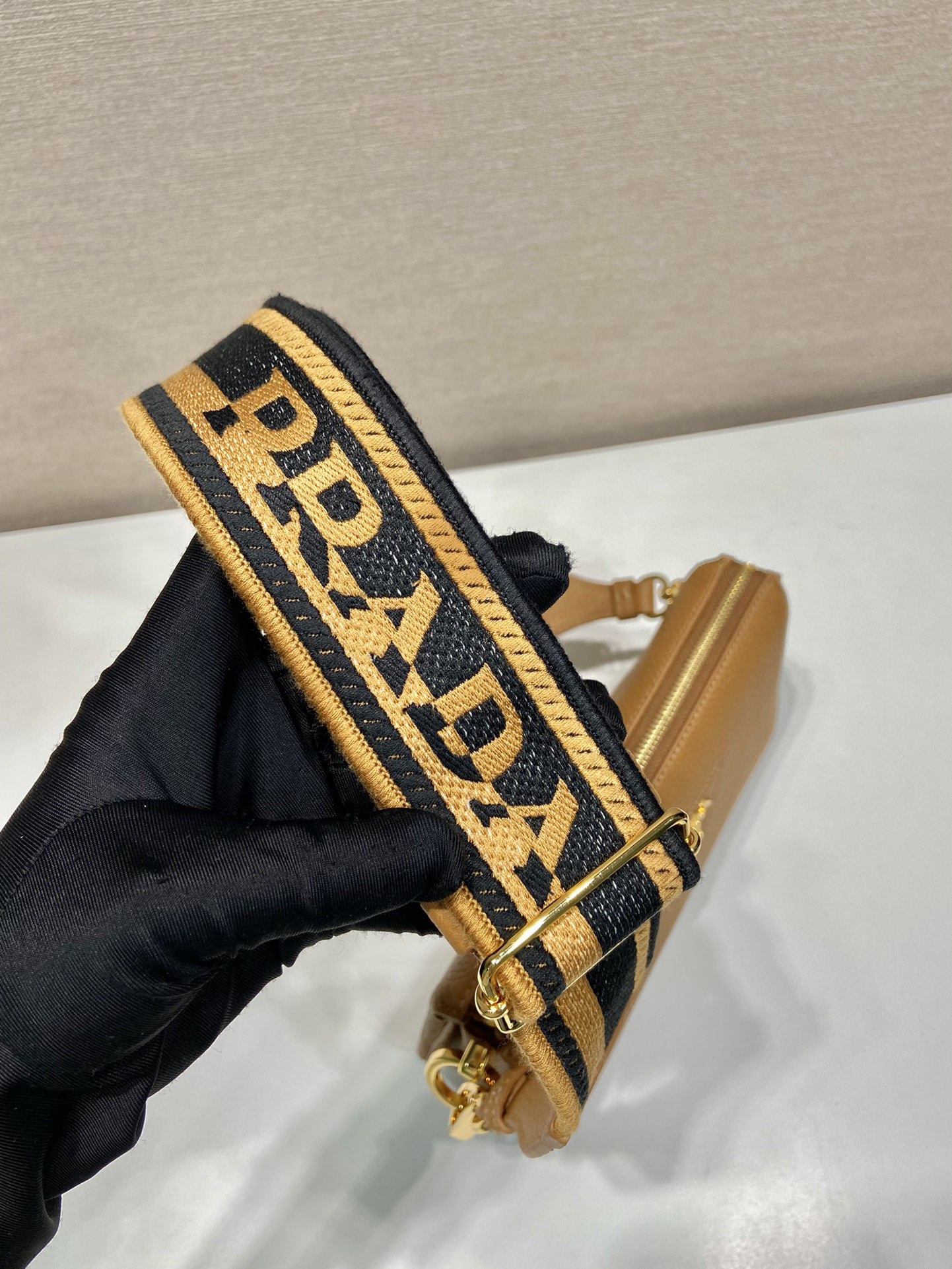 Pra*a leather shoulder bag