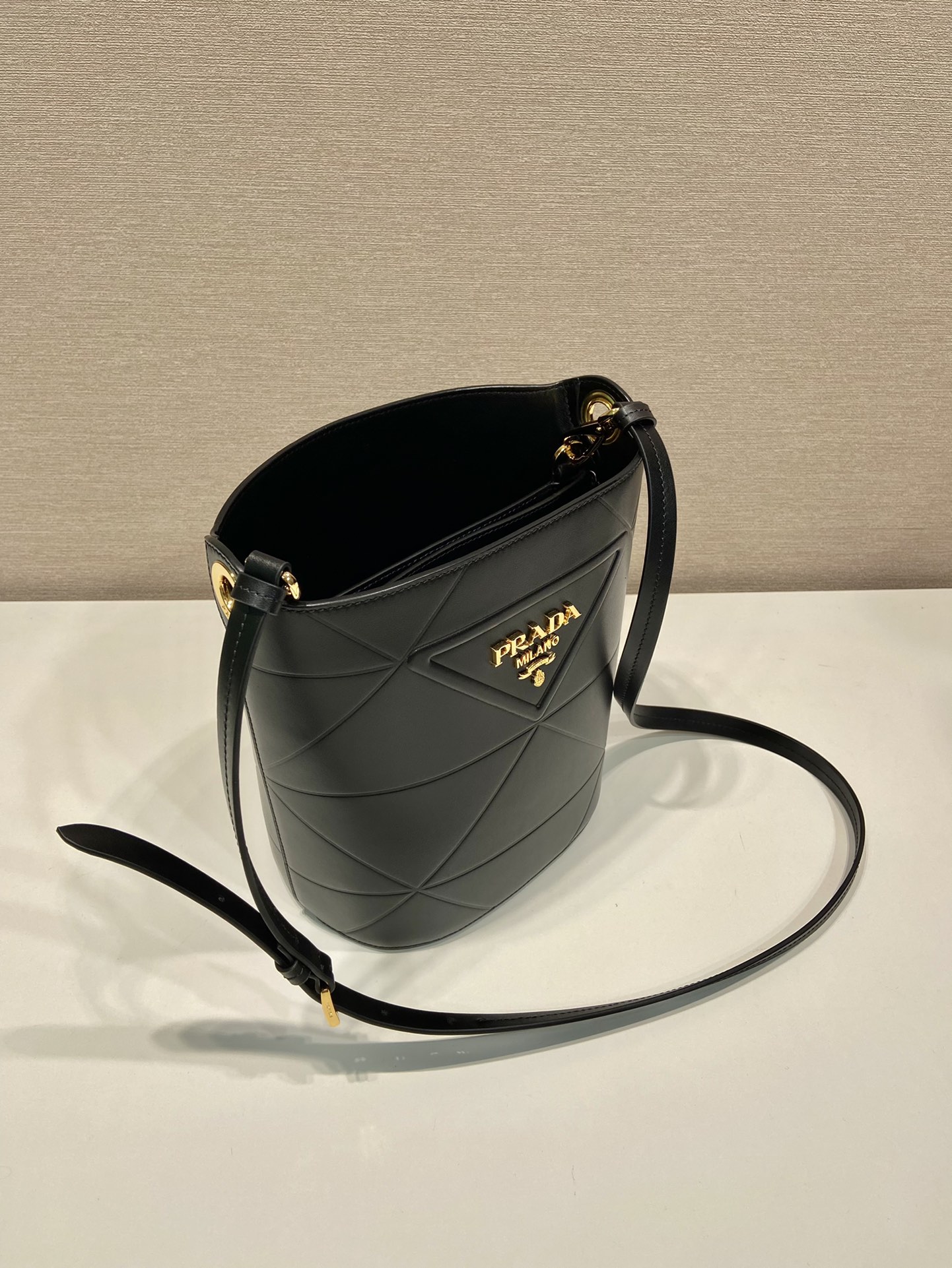 Pra*a leather bucket bag