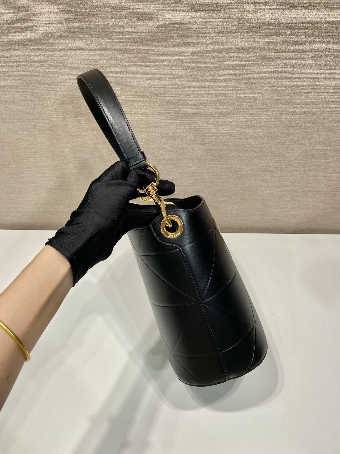 Pra*a leather bucket bag