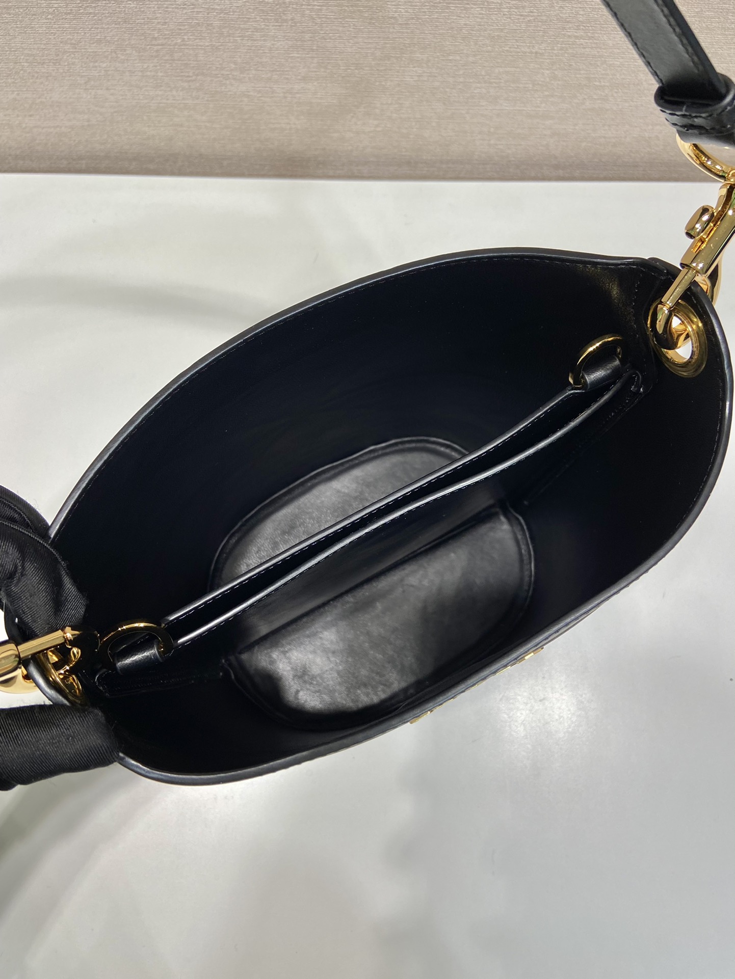 Pra*a leather bucket bag