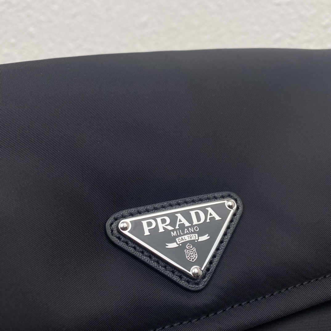 Pra*a black small padded re-nylon shoulder bag