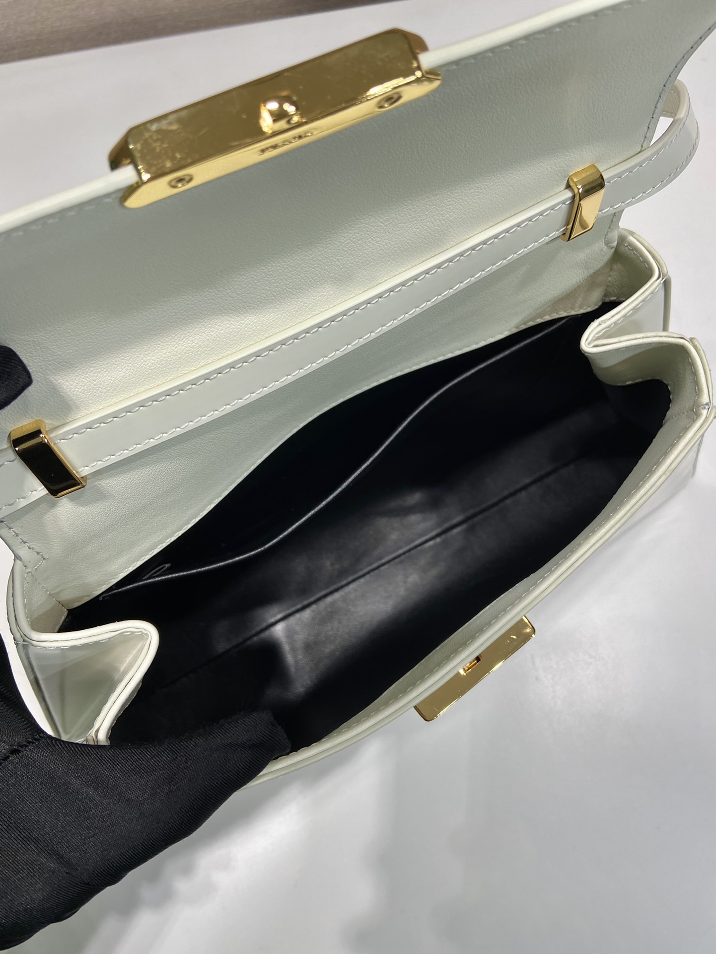 Pra*a brushed leather handbag