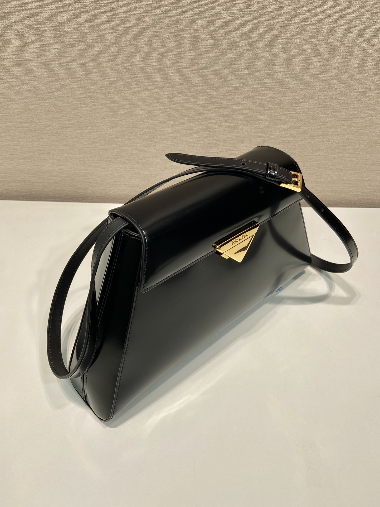 Pra*a brushed leather handbag