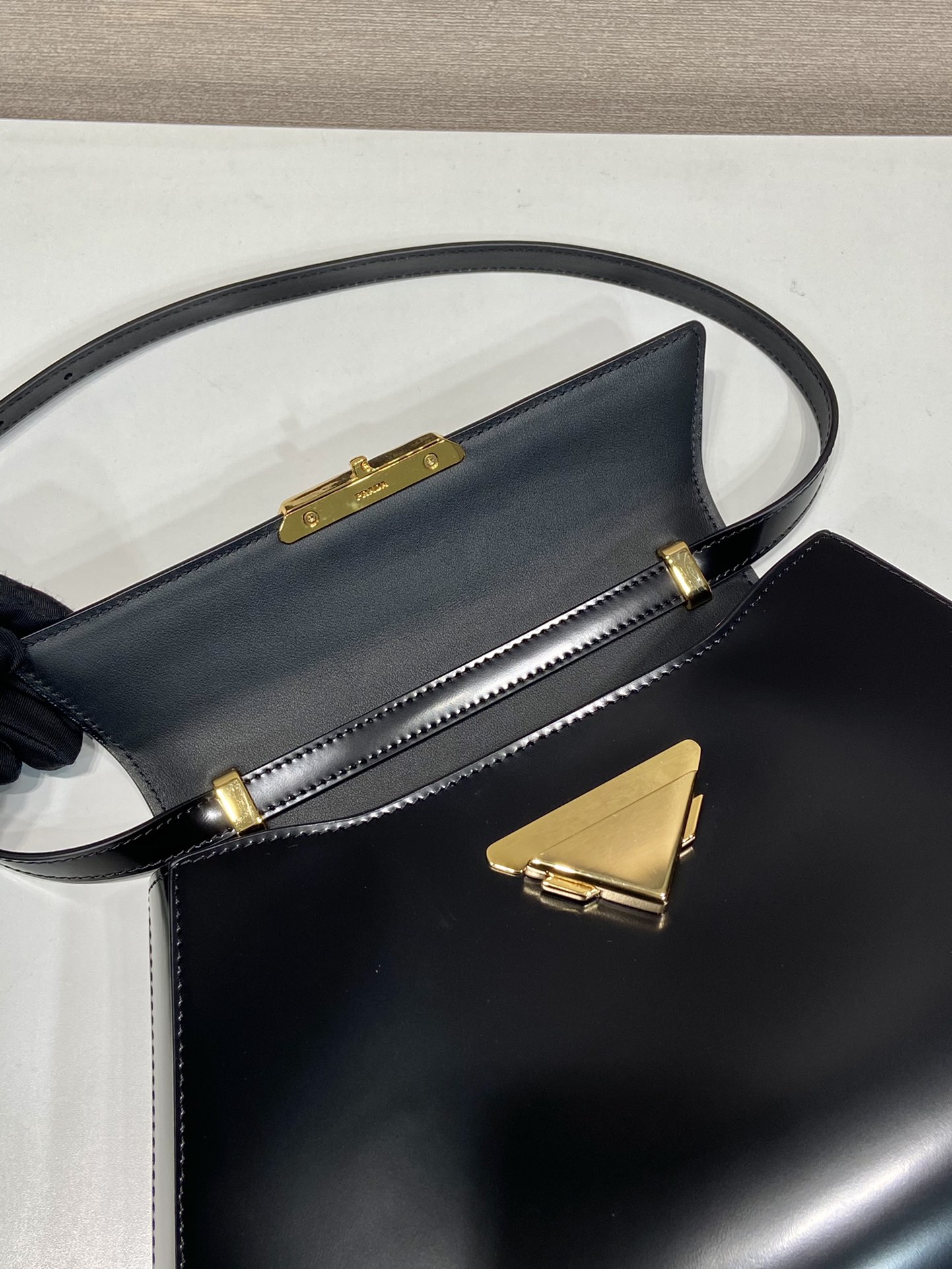 Pra*a brushed leather handbag