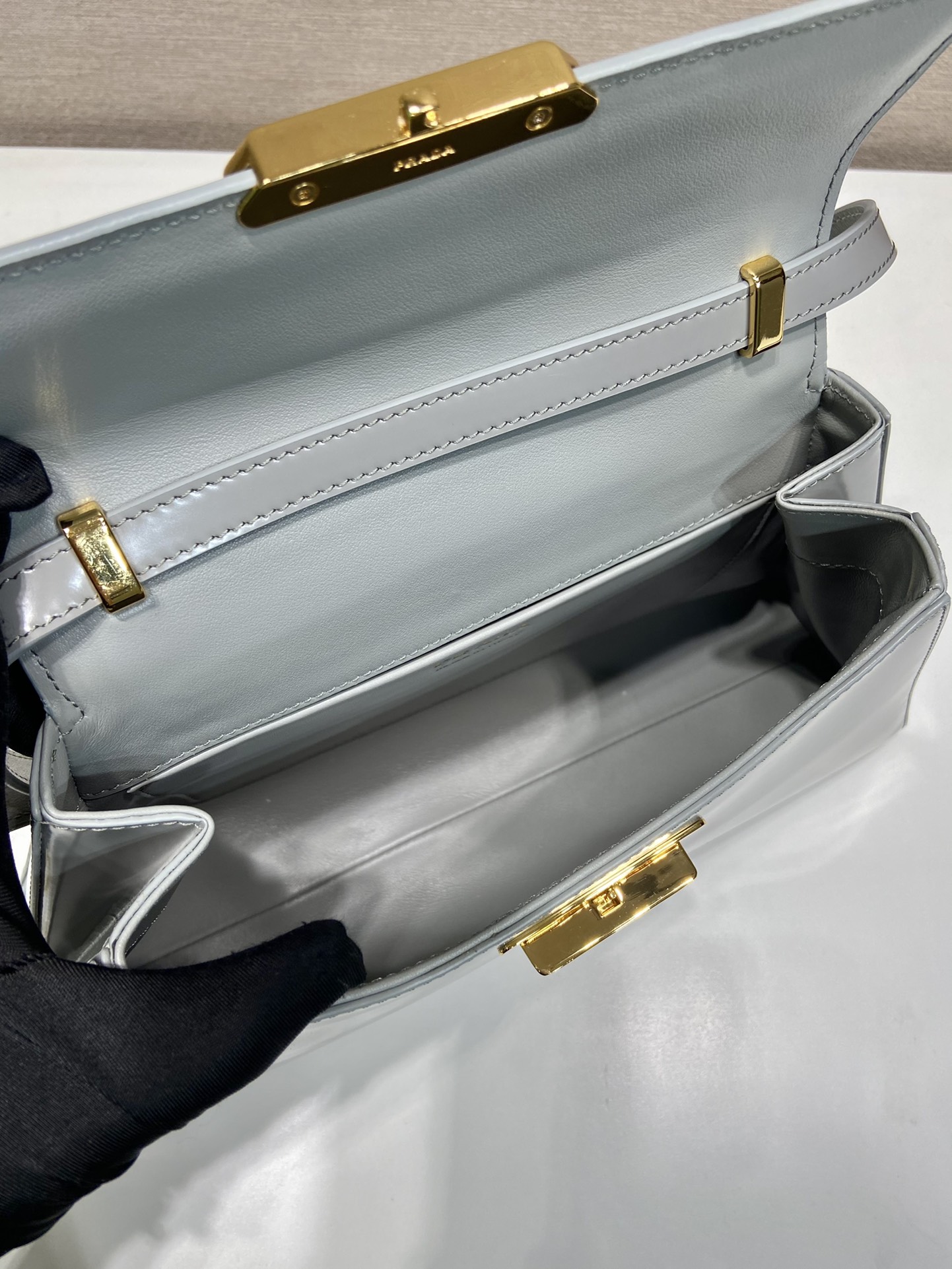 Pra*a brushed leather handbag