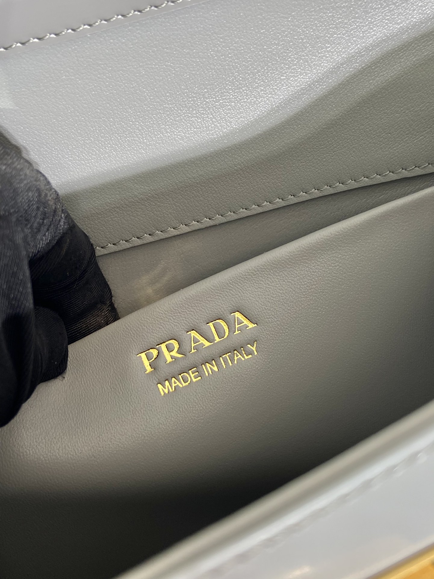 Pra*a brushed leather handbag