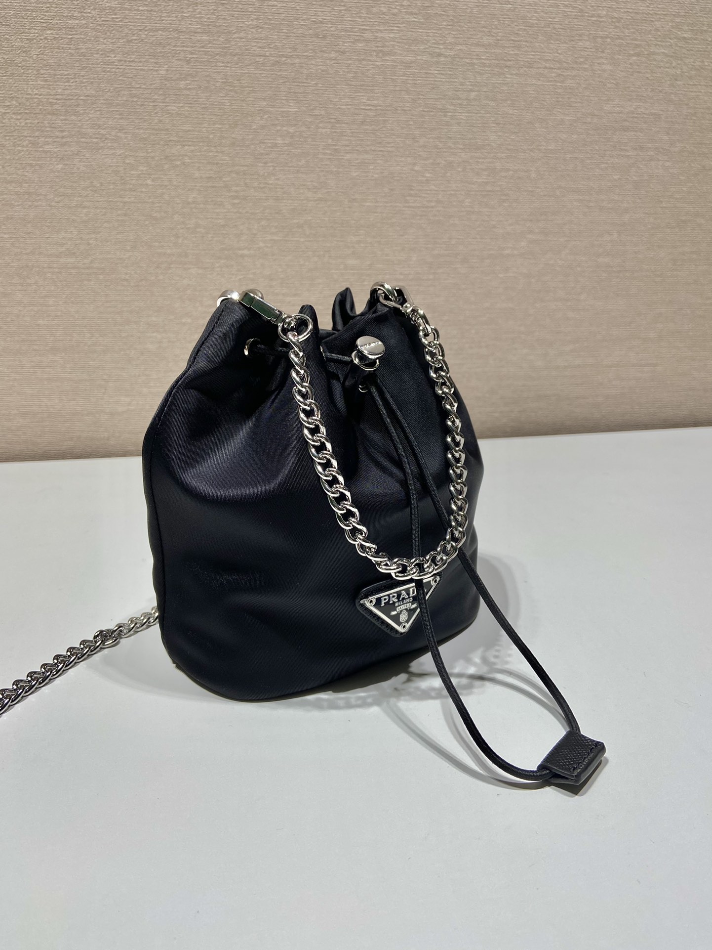 Pra*a mini bucket bag