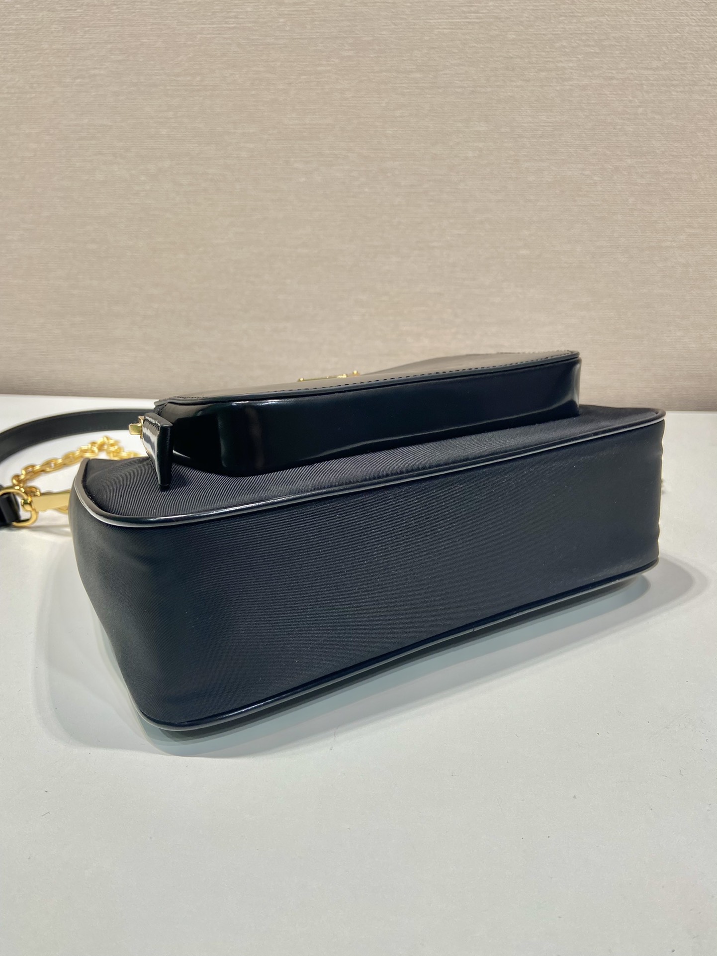 Pra*a re-nylon and brushed leather mini-bag