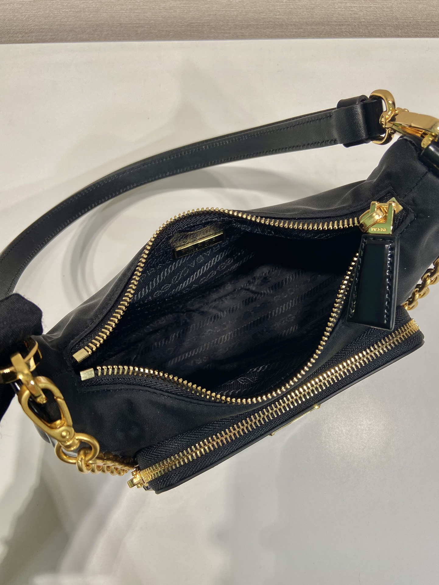 Pra*a re-nylon and brushed leather mini-bag