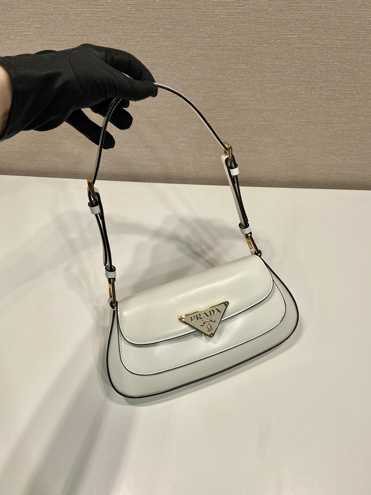 Pra*a brushed leather shoulder bag