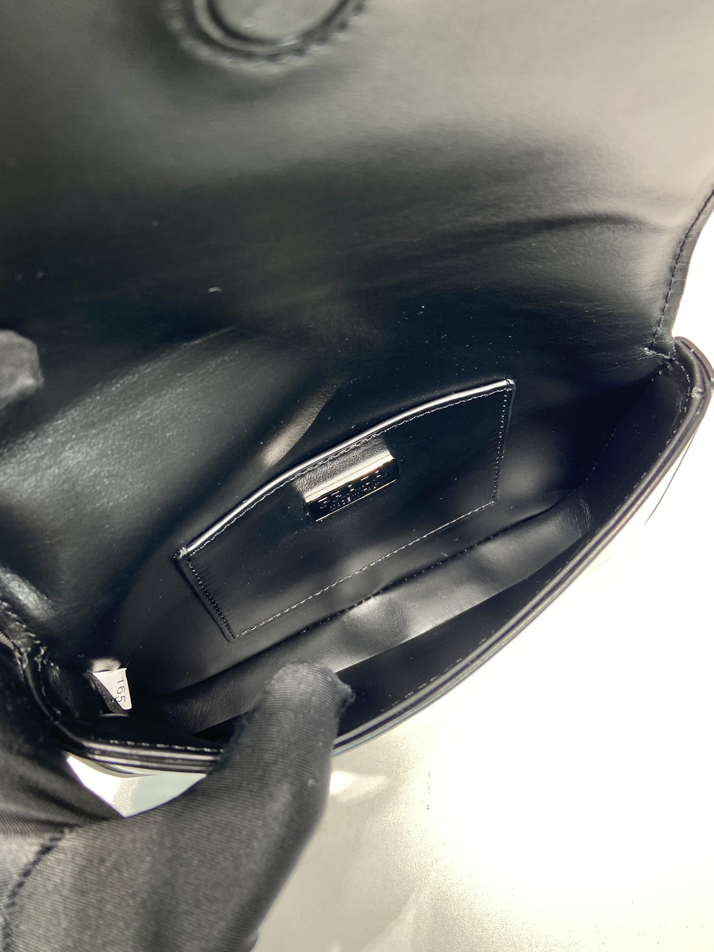 Pra*a brushed leather mini-bag with shoulder strap