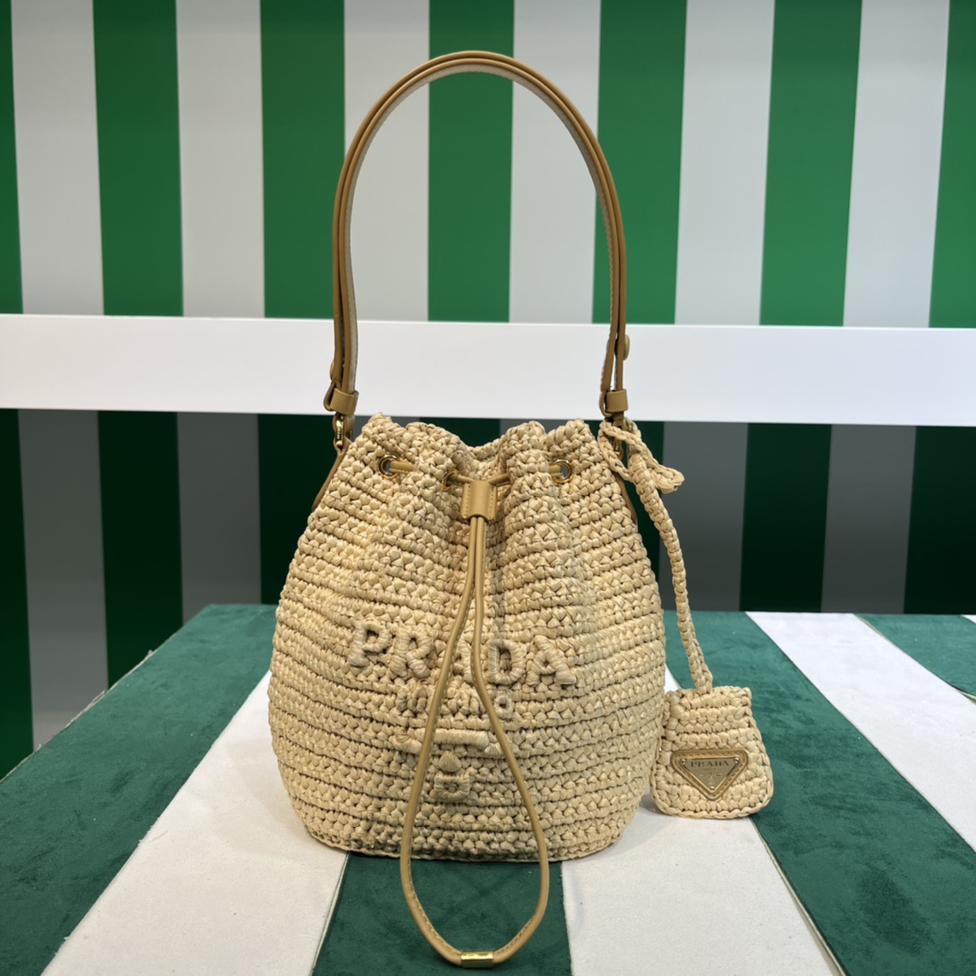 Pra*a crochet and leather mini-bucket bag