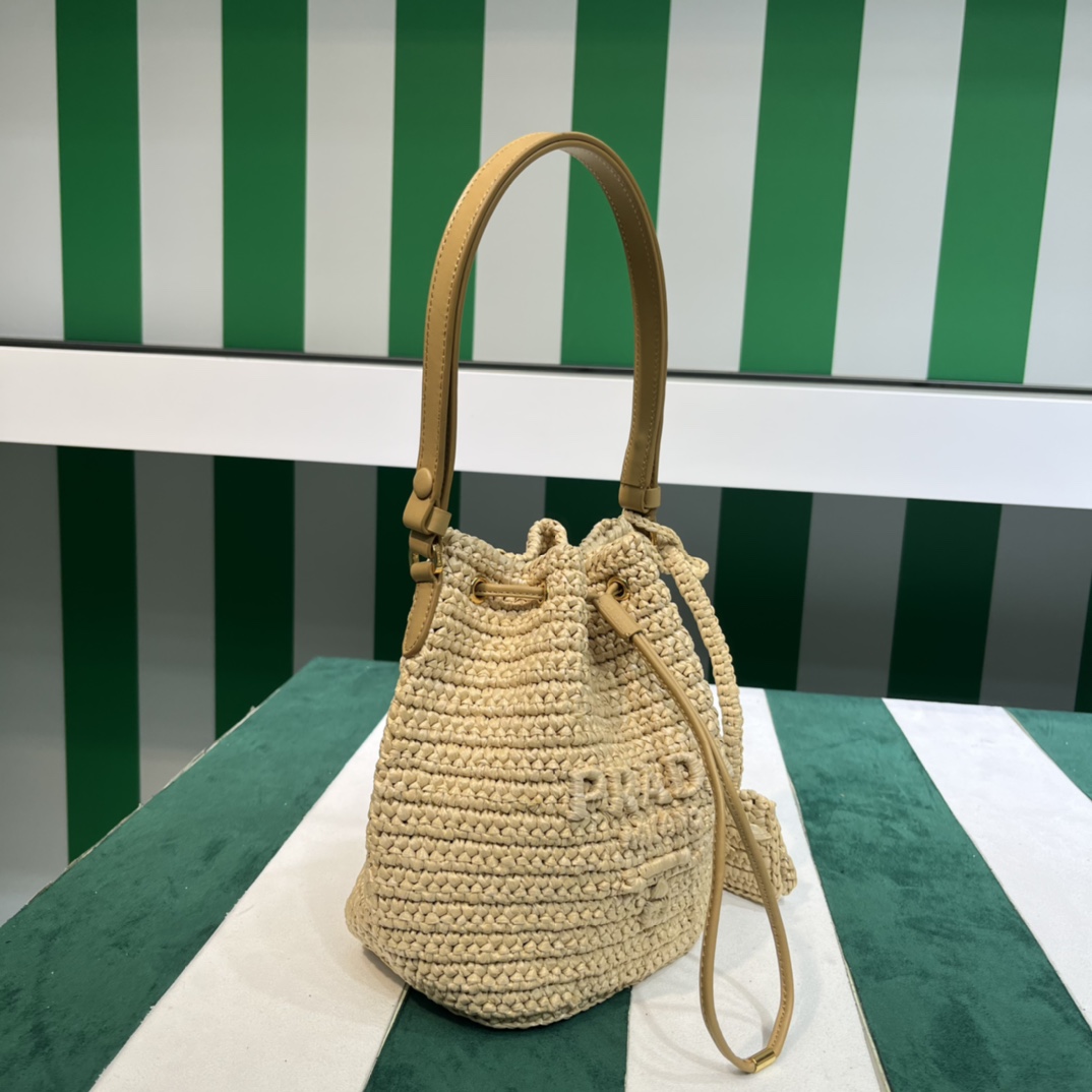 Pra*a crochet and leather mini-bucket bag