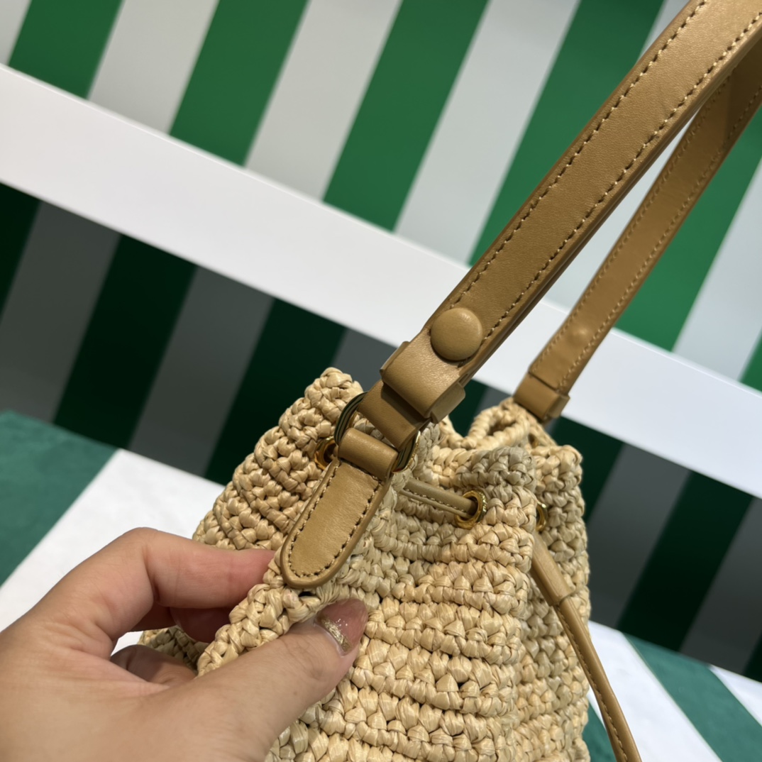 Pra*a crochet and leather mini-bucket bag
