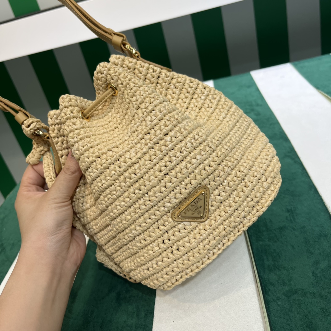 Pra*a crochet and leather mini-bucket bag