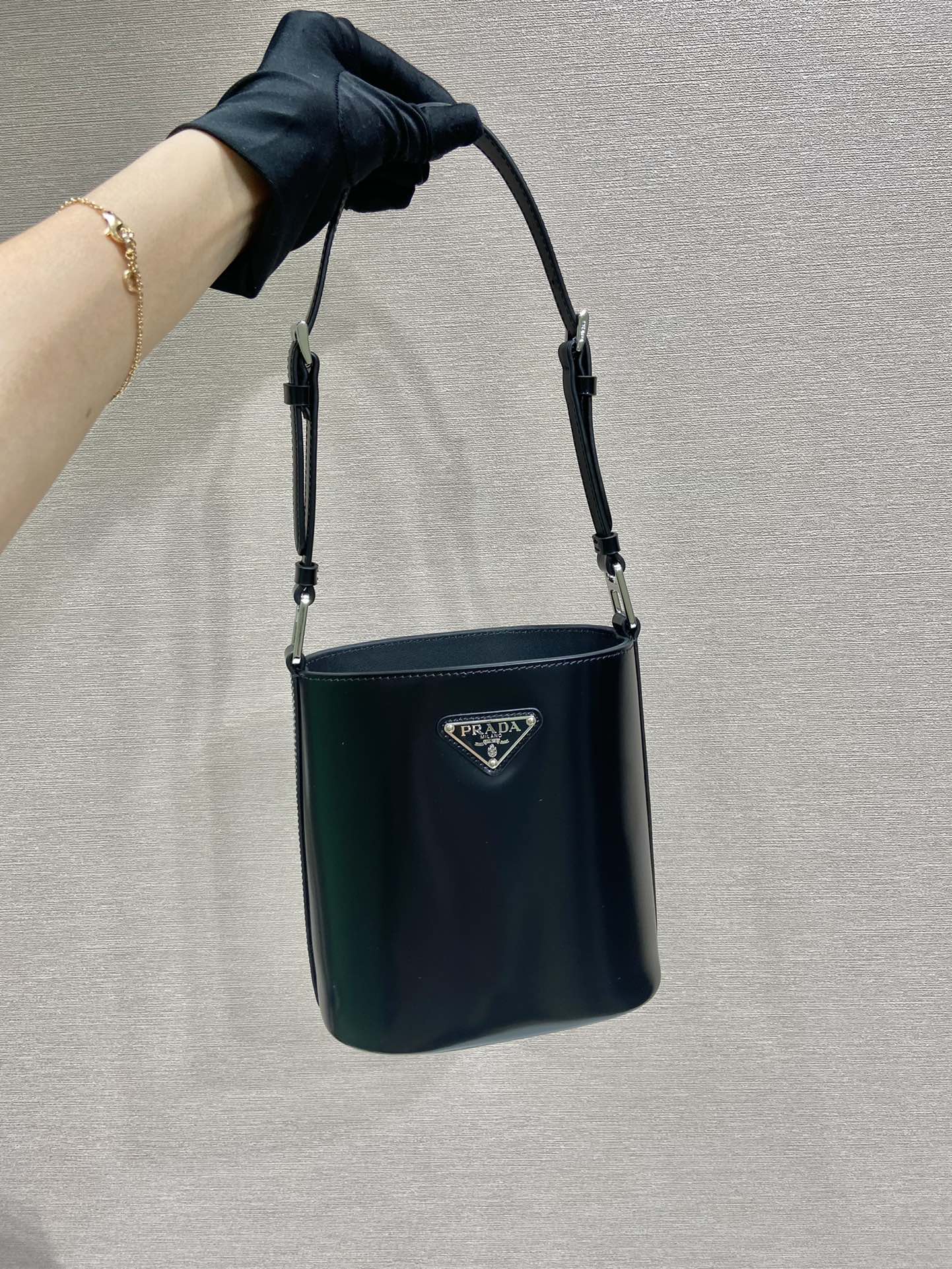 Pra*a mini brushed-leather bucket bag