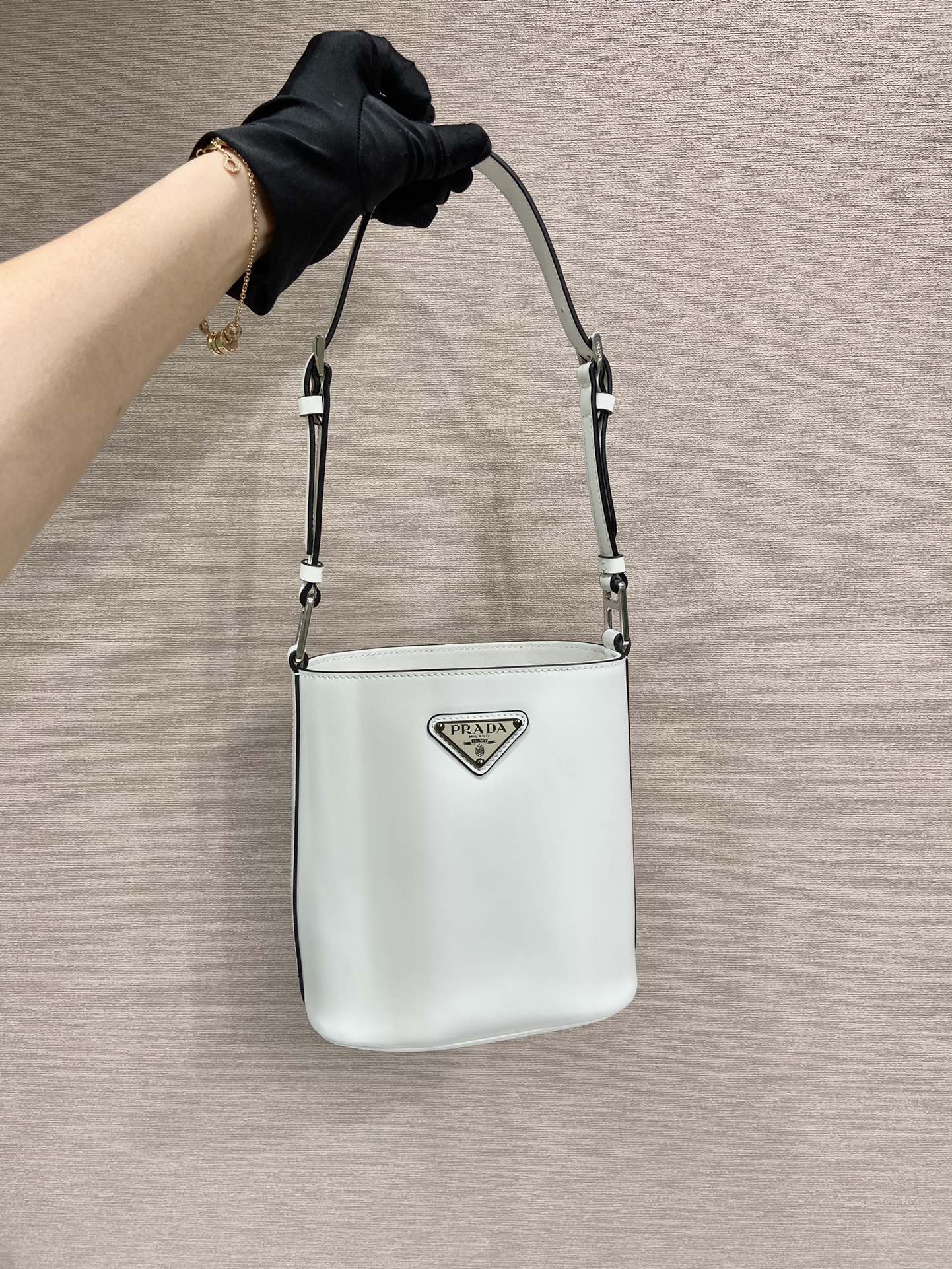 Pra*a mini brushed-leather bucket bag