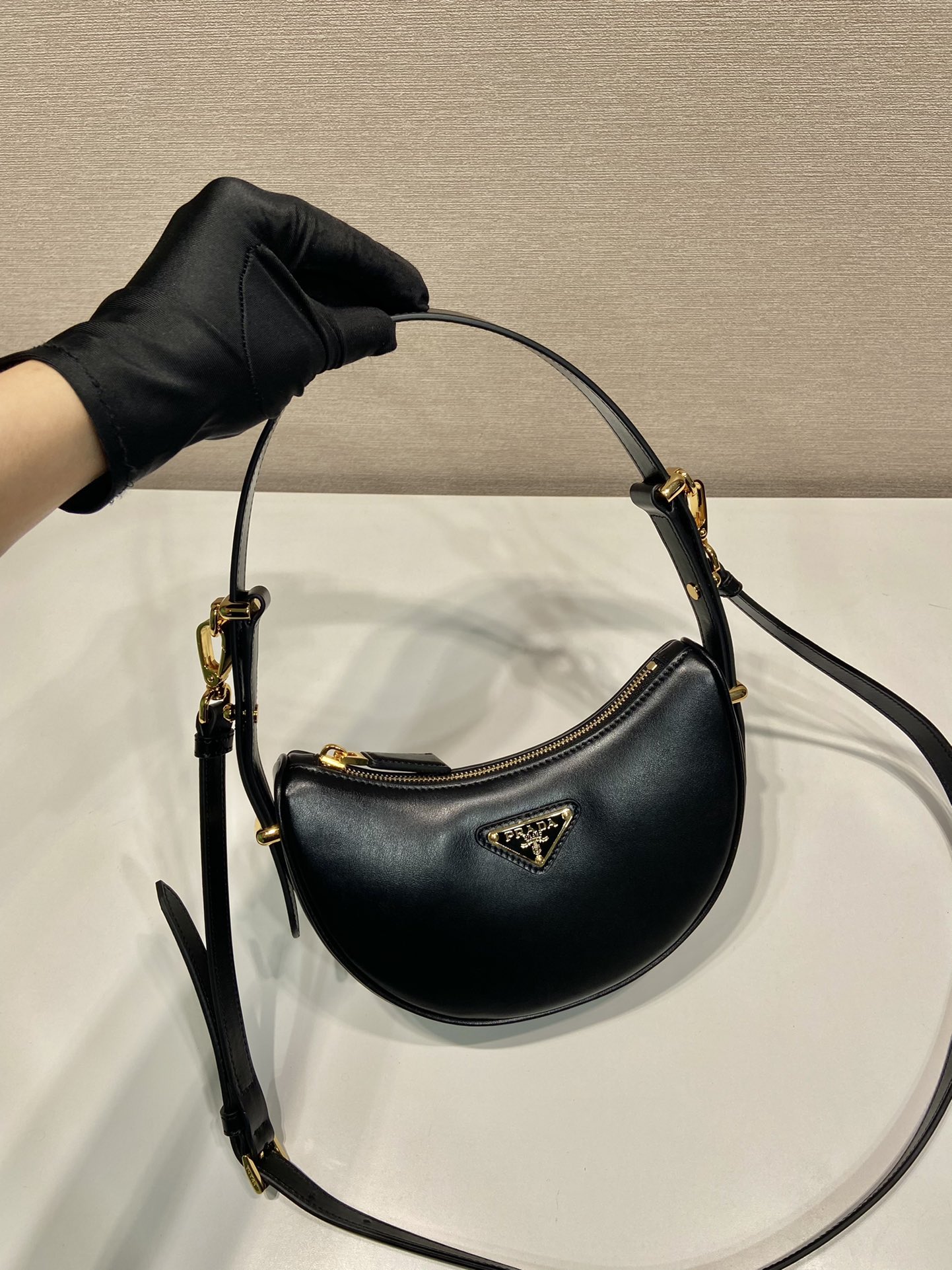 Pra*a arqué leather mini shoulder bag