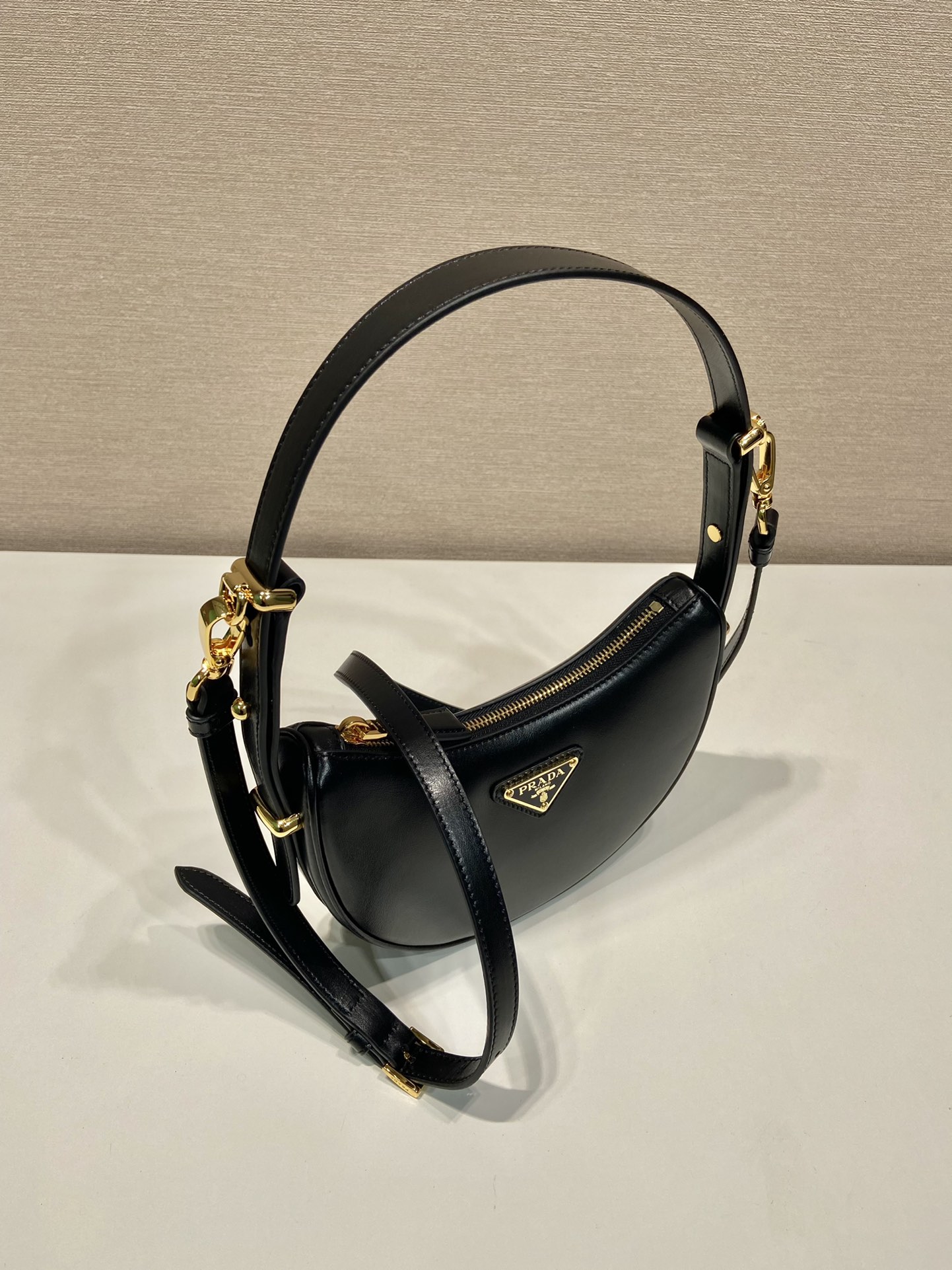 Pra*a arqué leather mini shoulder bag