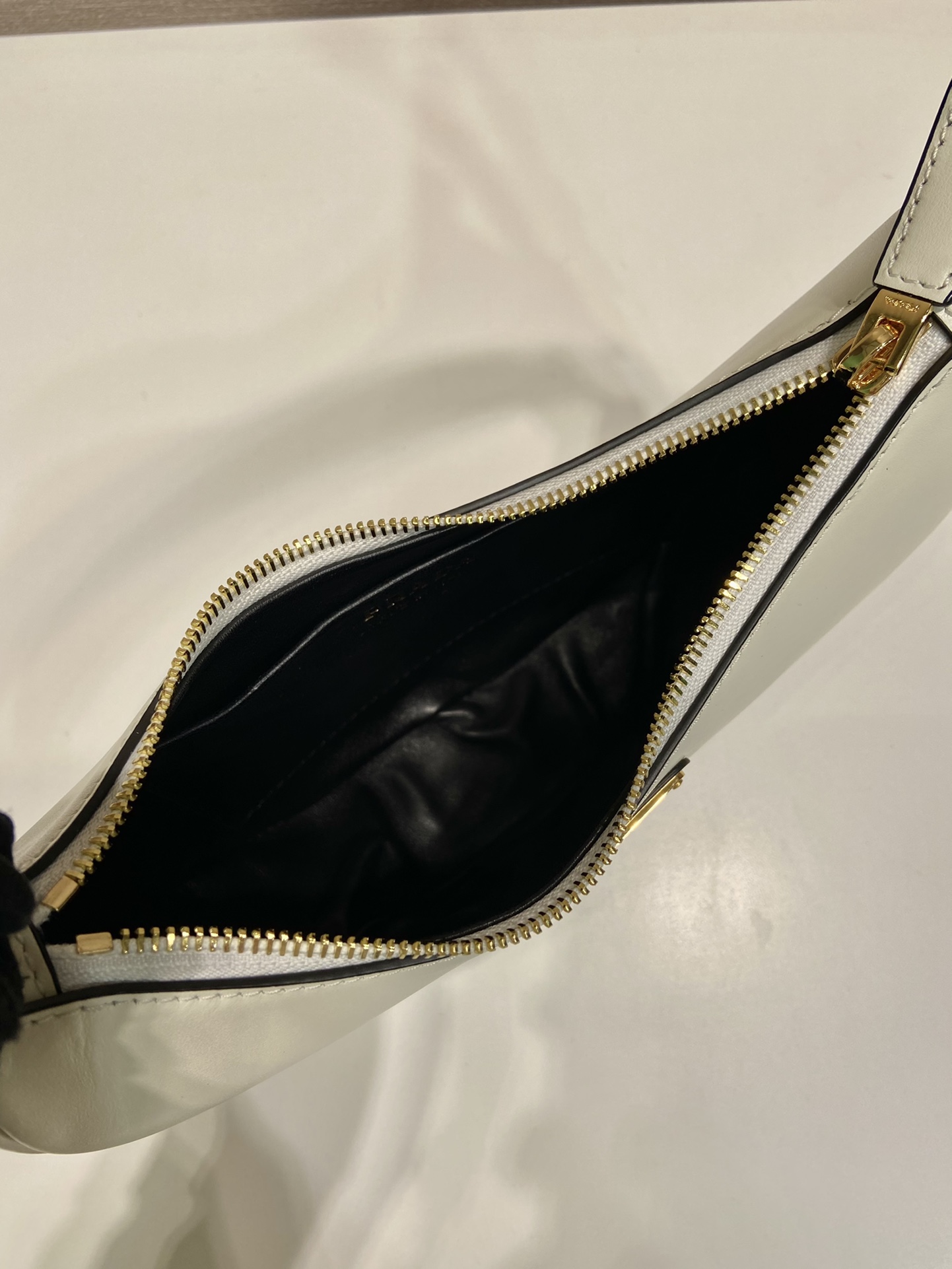 Pra*a arqué leather shoulder bag