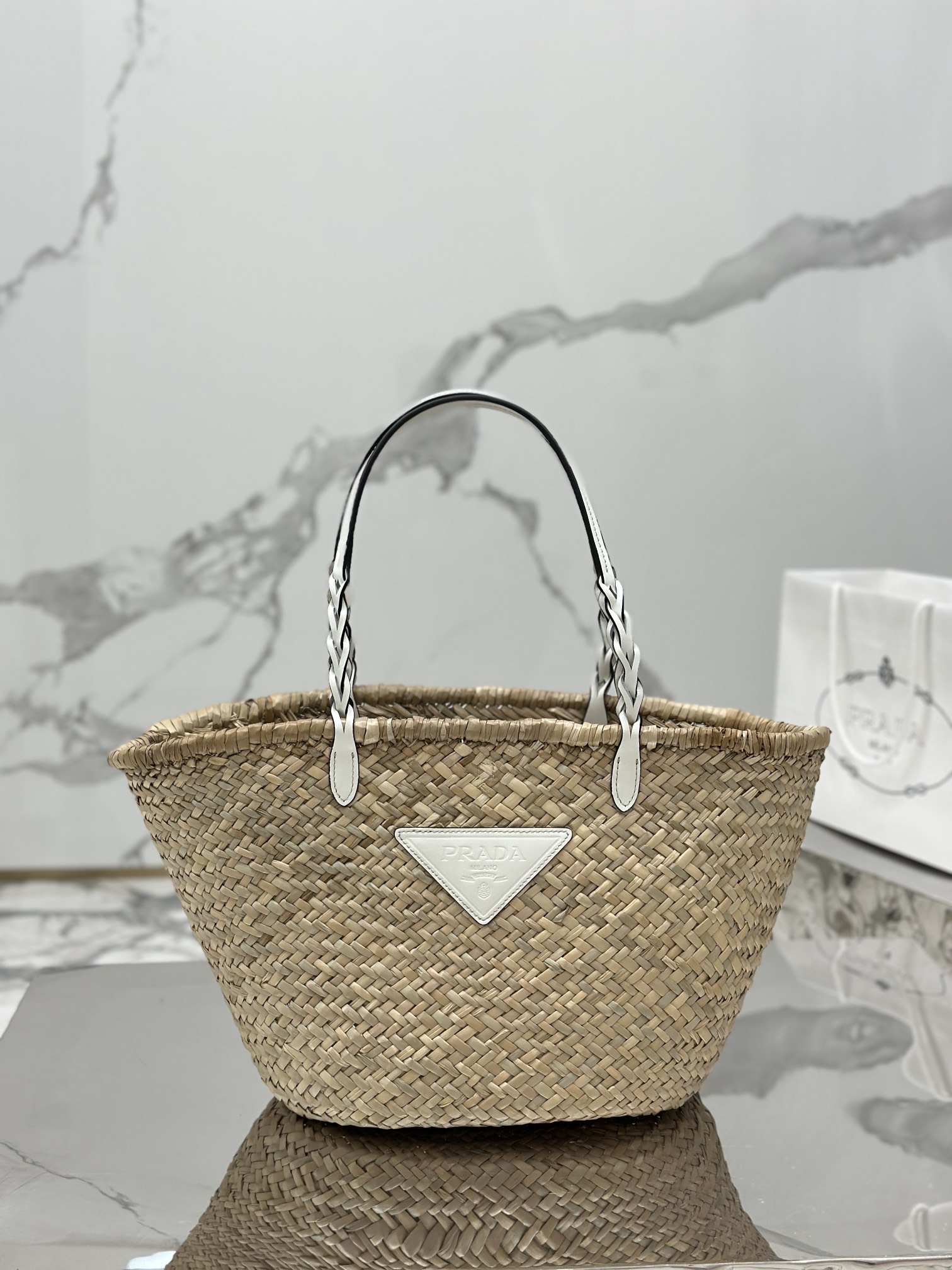 Pra*a woven palm and leather tote