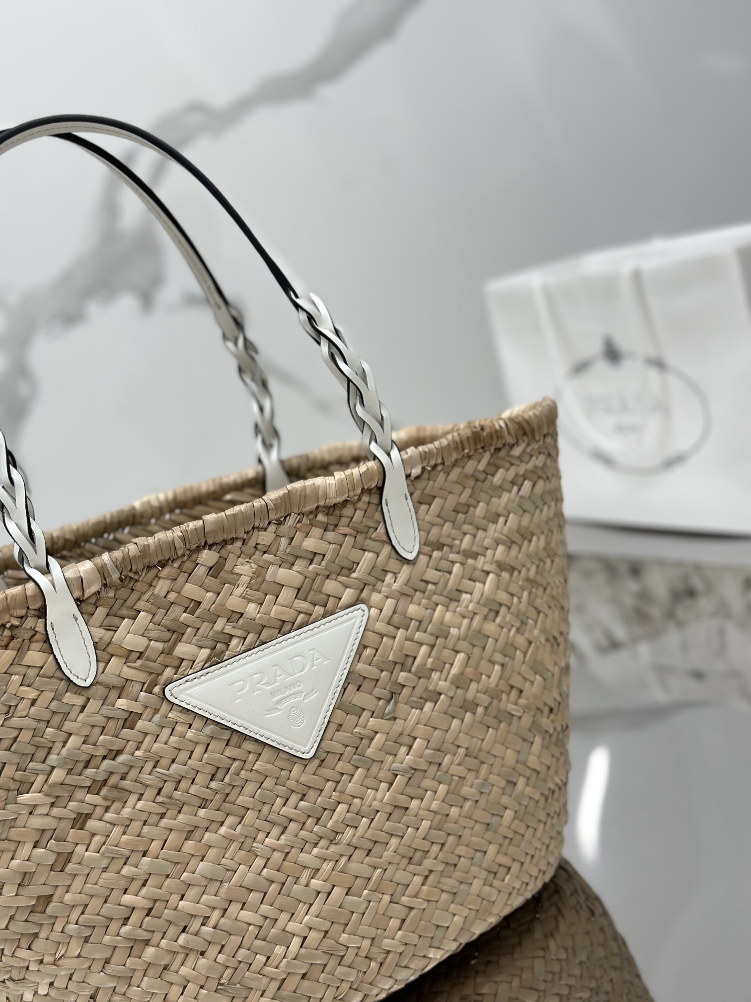 Pra*a woven palm and leather tote