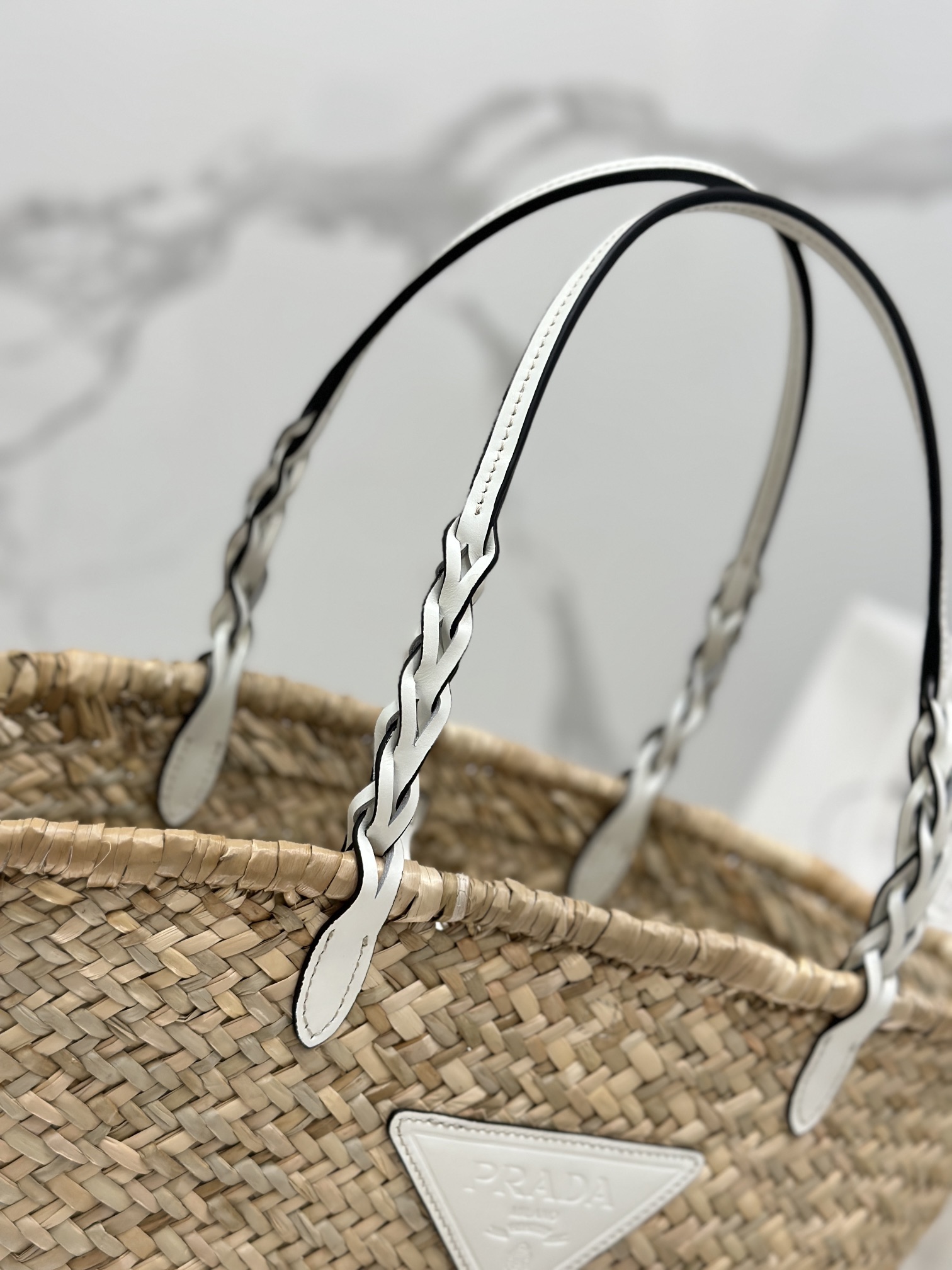 Pra*a woven palm and leather tote