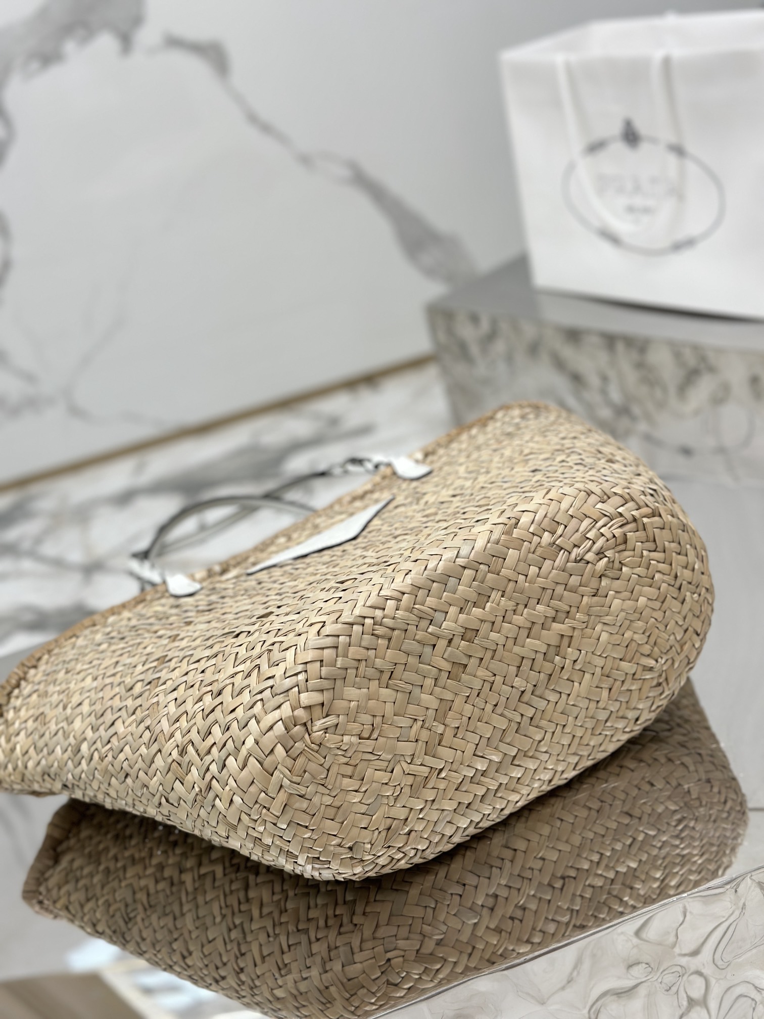 Pra*a woven palm and leather tote
