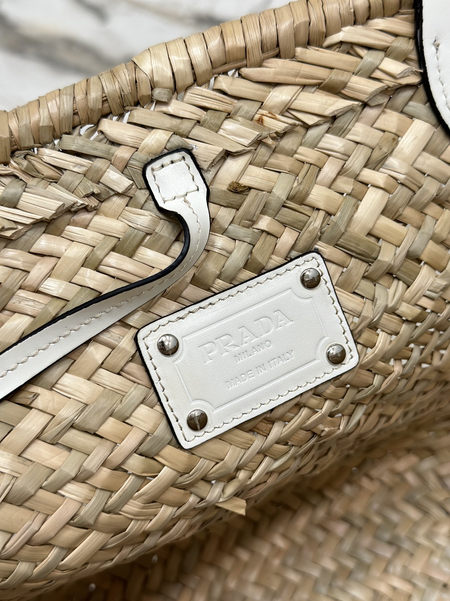 Pra*a woven palm and leather tote