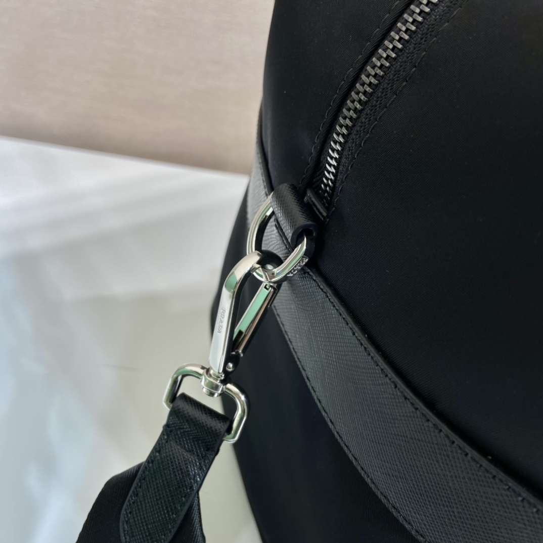 Pra*a re-nylon and saffiano leather duffle bag