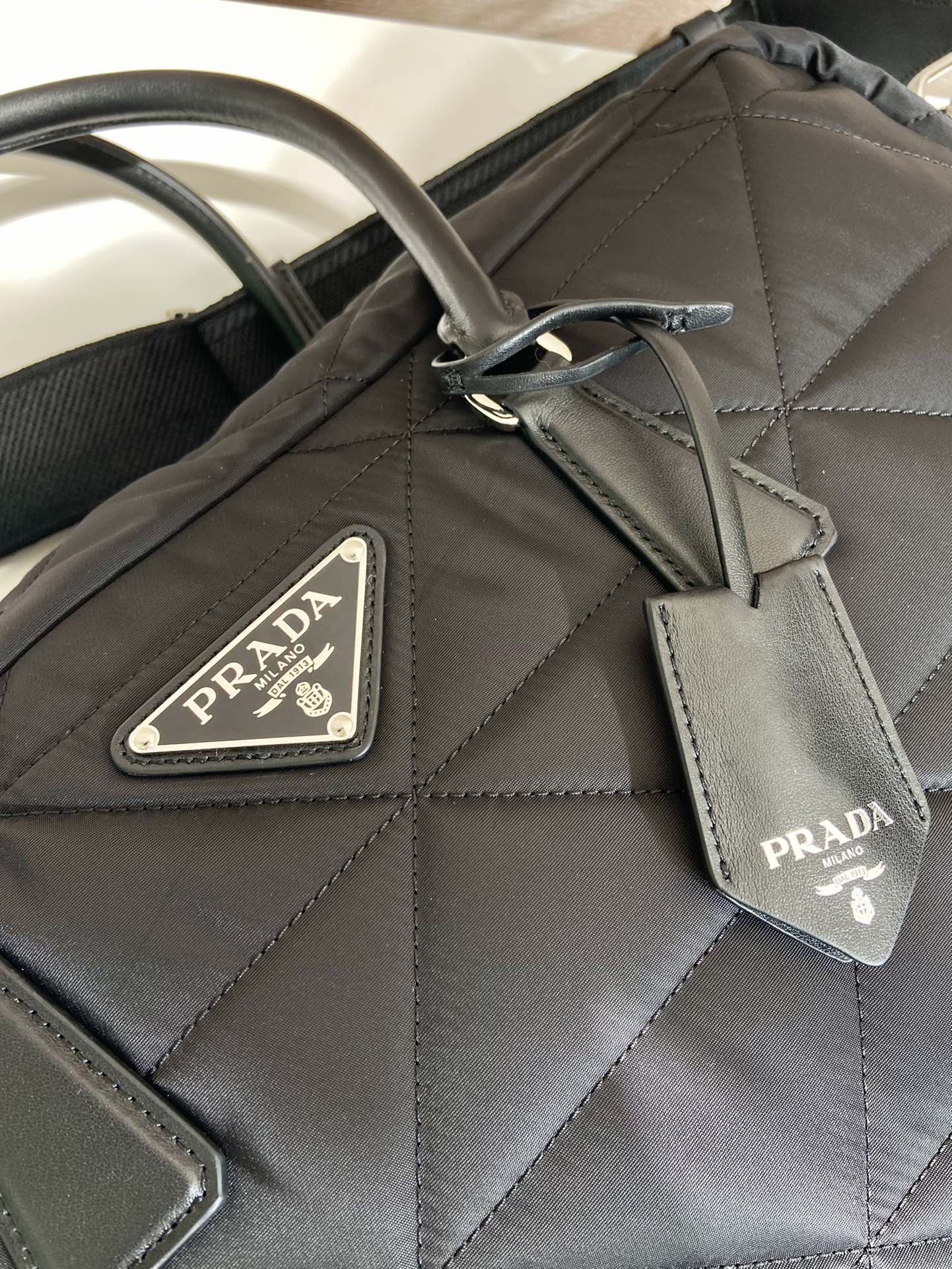 Pra*a quilted re-nylon travel bag