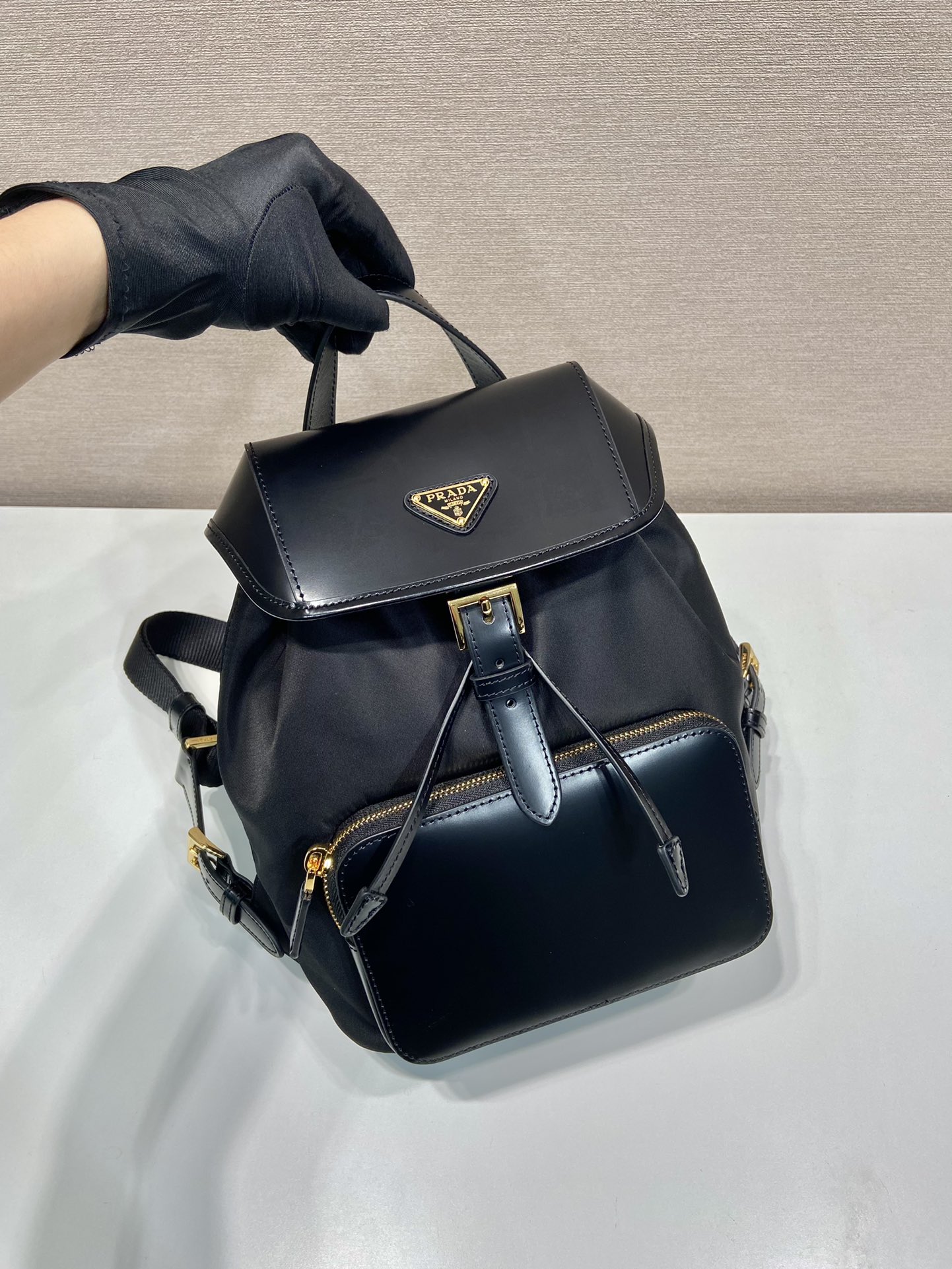 Pra*a re-nylon and brushed leather backpack