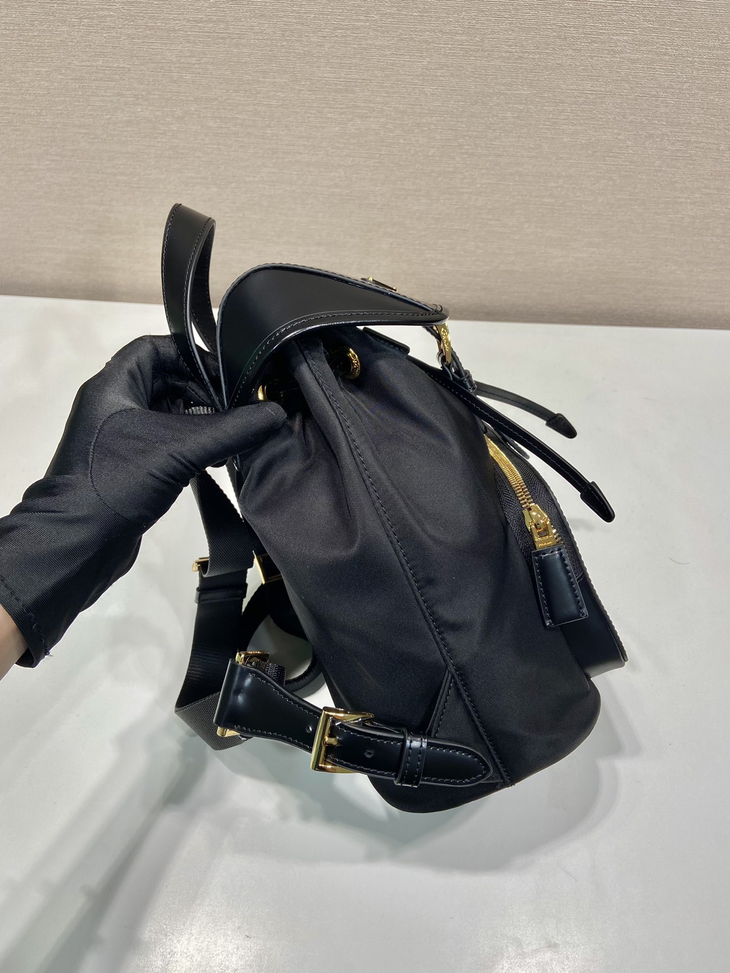 Pra*a re-nylon and brushed leather backpack