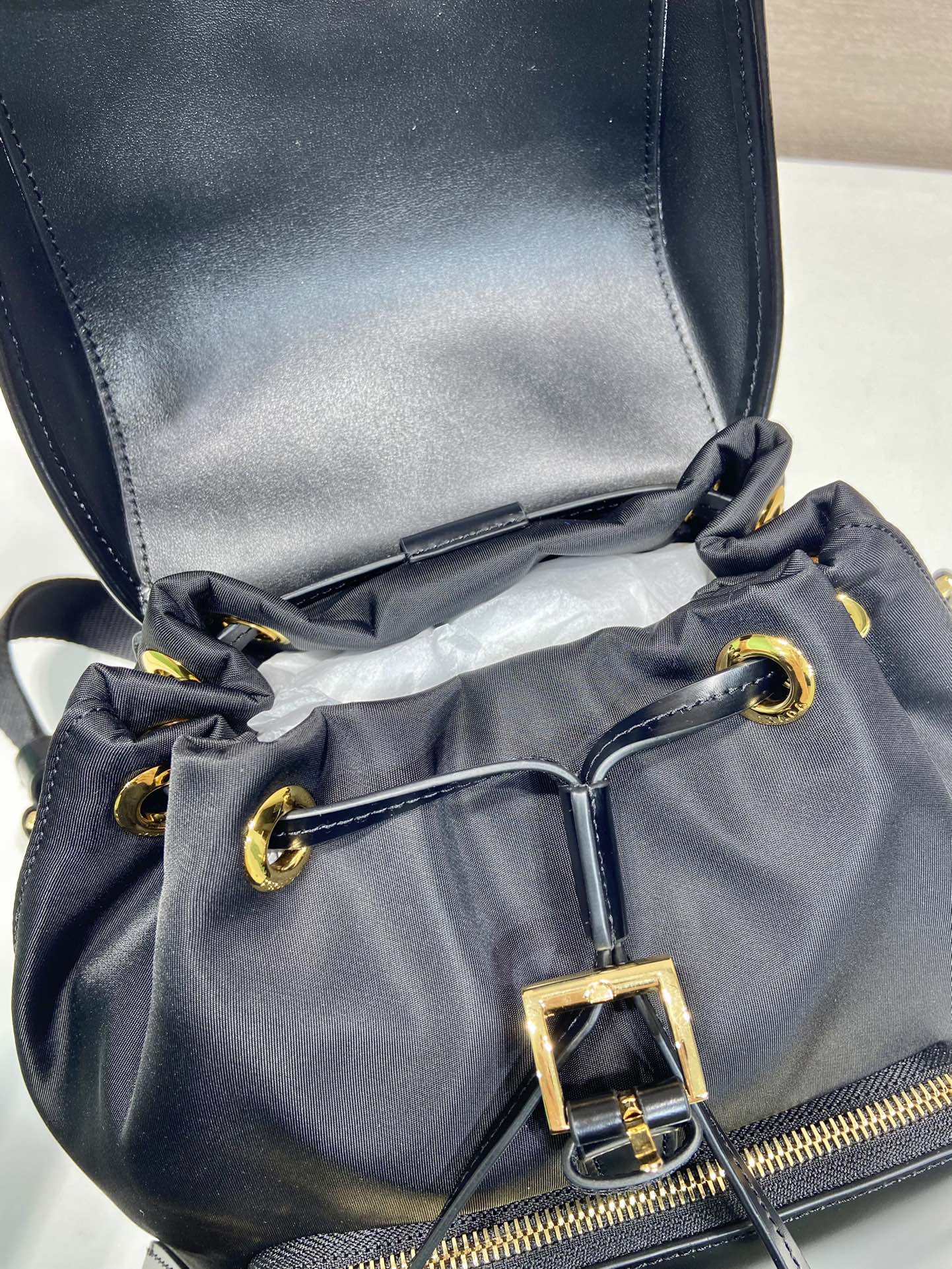 Pra*a re-nylon and brushed leather backpack