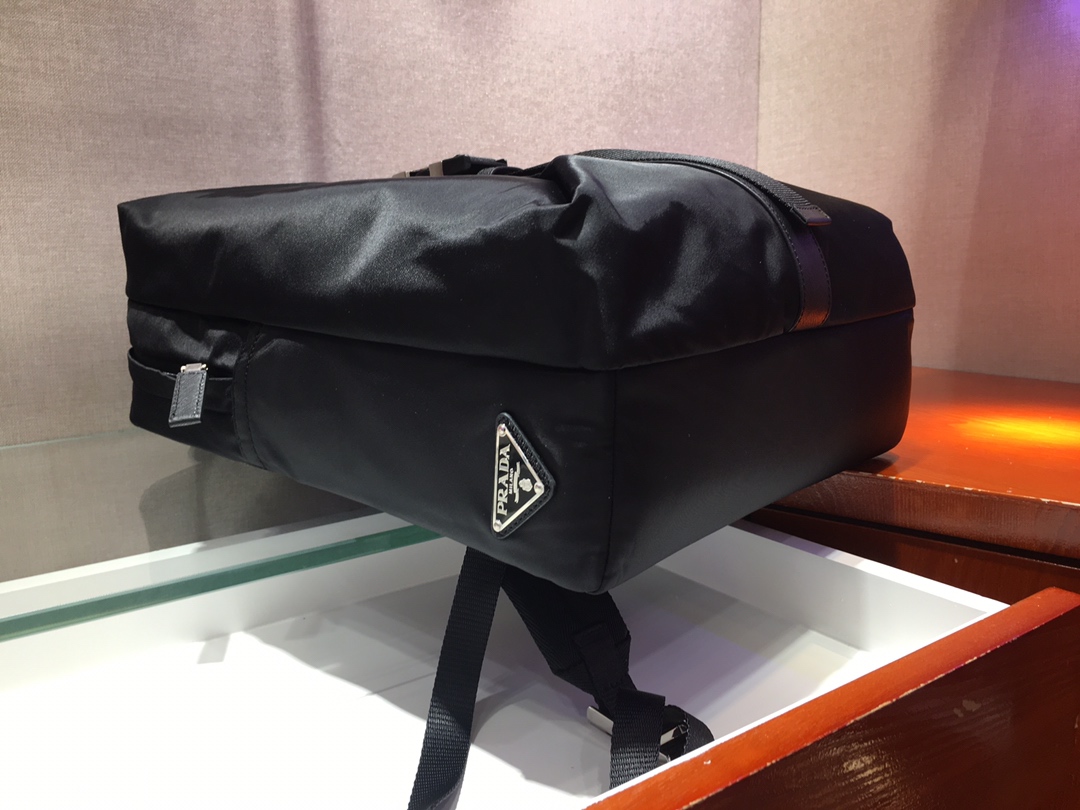 Pra*a re-nylon and saffiano leather backpack