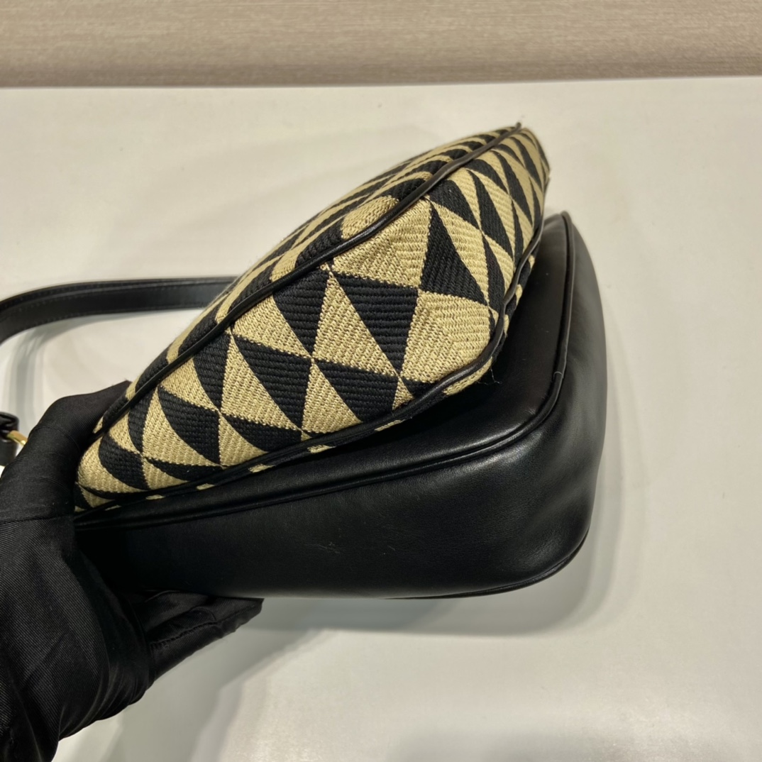 Pra*a symbole leather and fabric mini bag