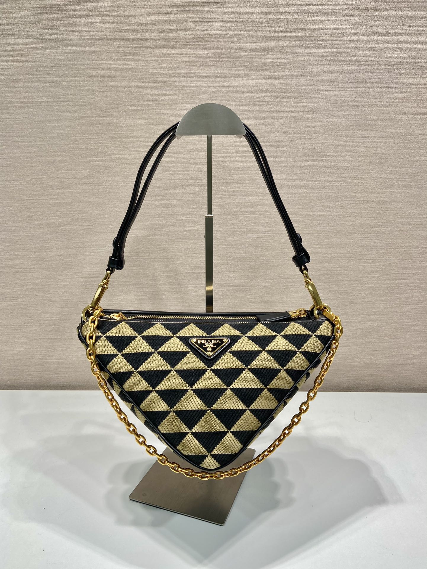 Pra*a symbole leather and fabric mini bag
