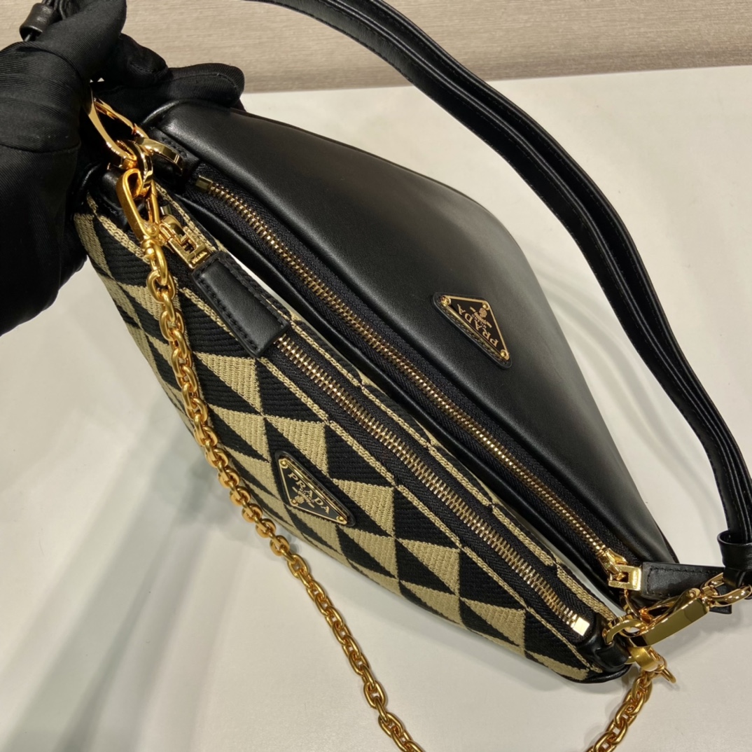 Pra*a symbole leather and fabric mini bag