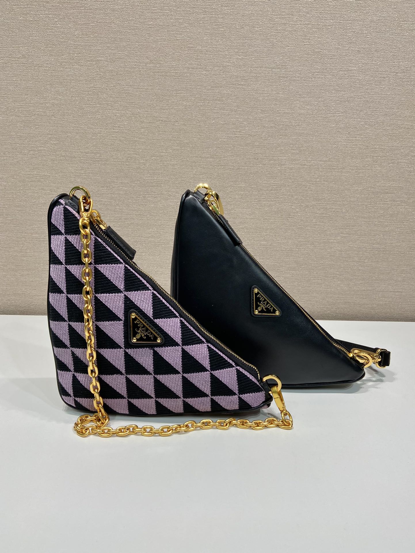 Pra*a symbole leather and fabric mini bag
