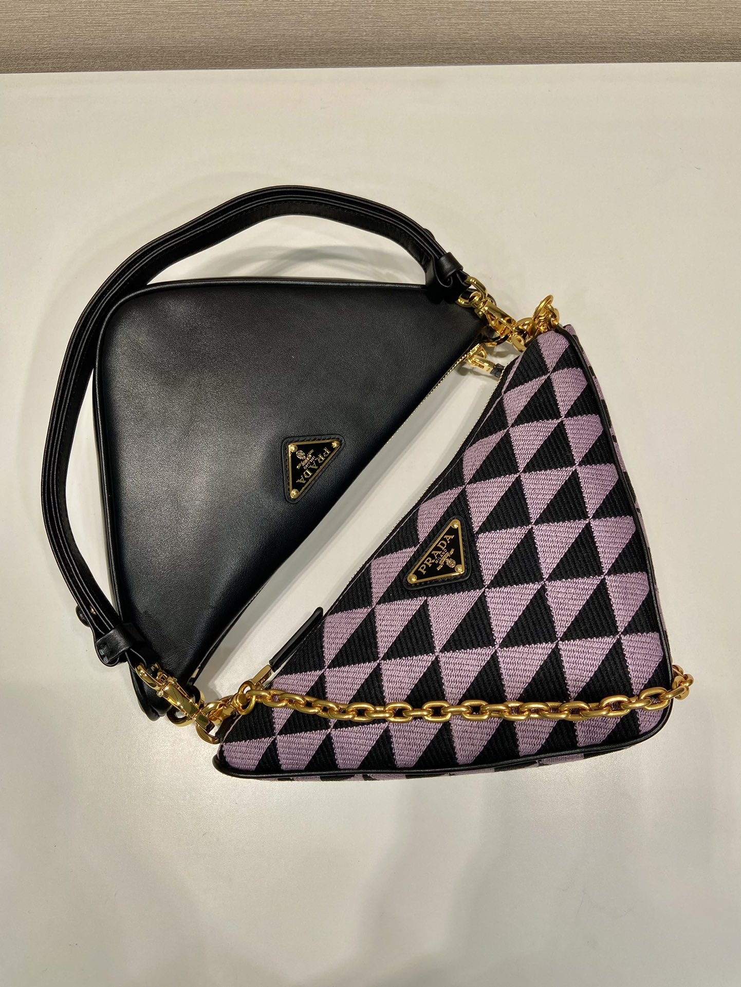 Pra*a symbole leather and fabric mini bag