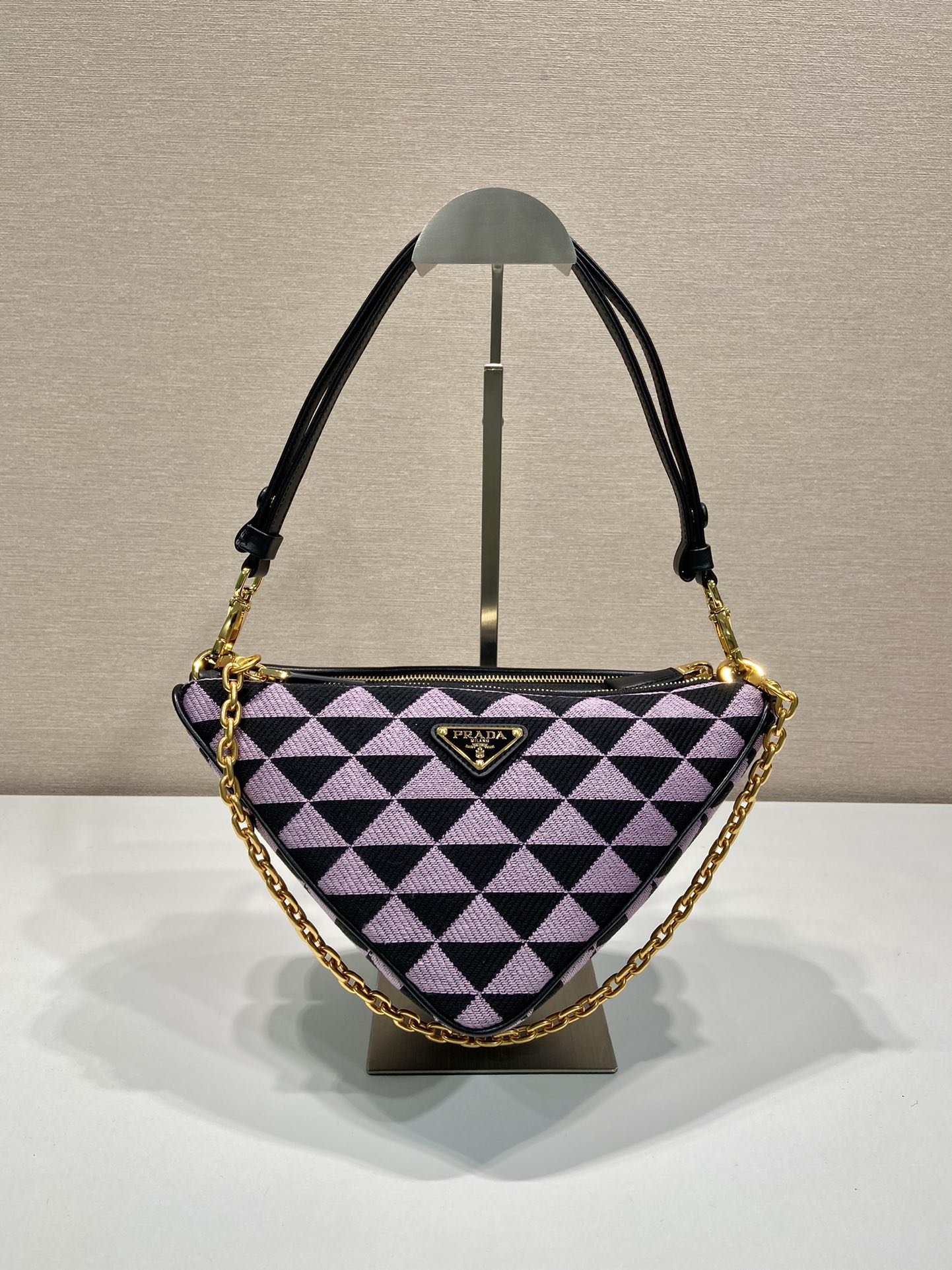 Pra*a symbole leather and fabric mini bag