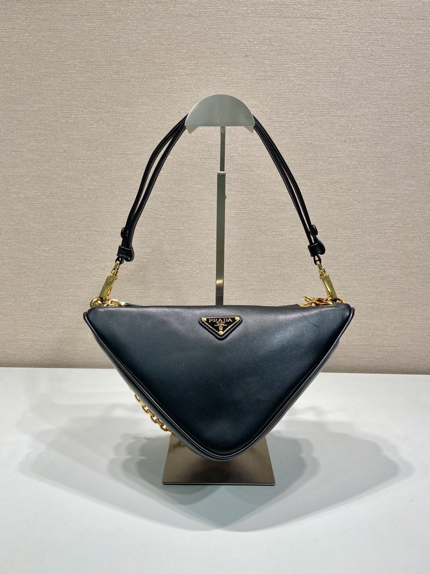 Pra*a symbole leather and fabric mini bag