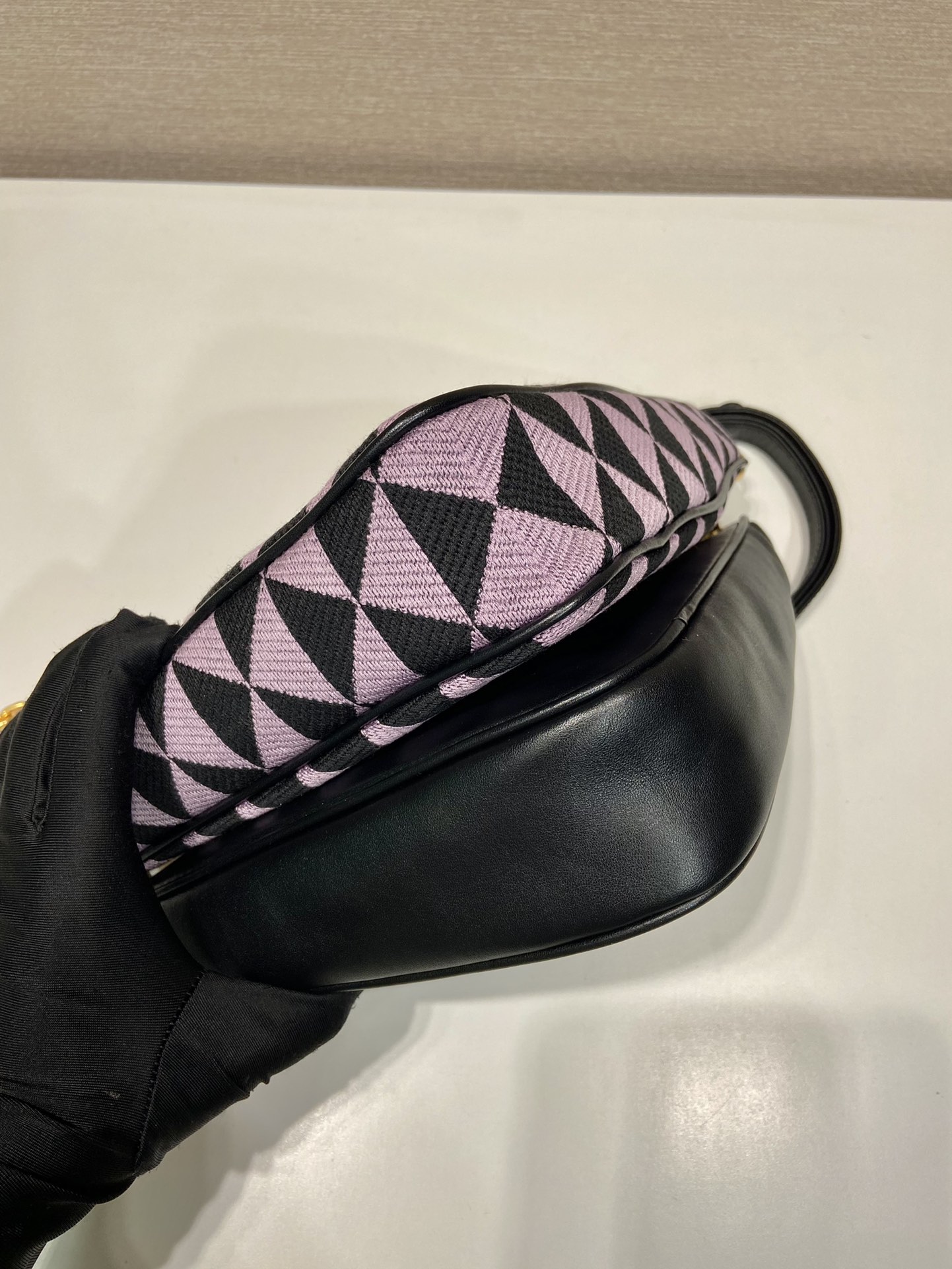 Pra*a symbole leather and fabric mini bag